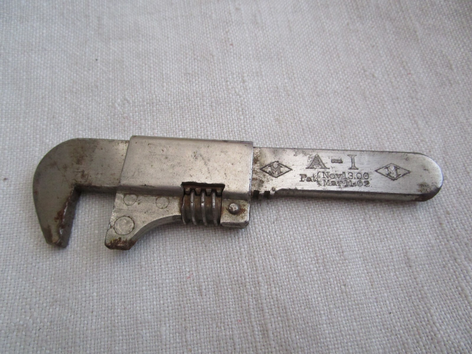 Really Old Stainless Miniature? Small Wrench/pipe wrench signed MY24-13