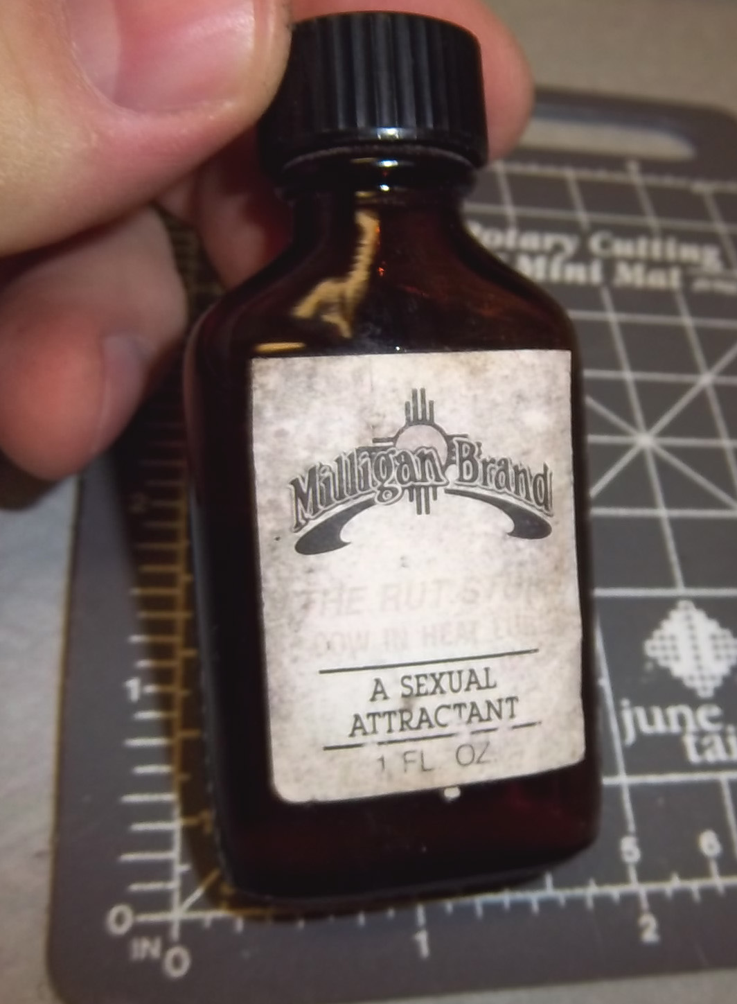 Milligan brand bottle of sexual attractant - the rut stuff, cow in heat lure