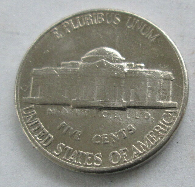 1995-P JEFFERSON REVERSE DIE CHIP BETWEEN LAST "O" AND "R" OF AMERICA