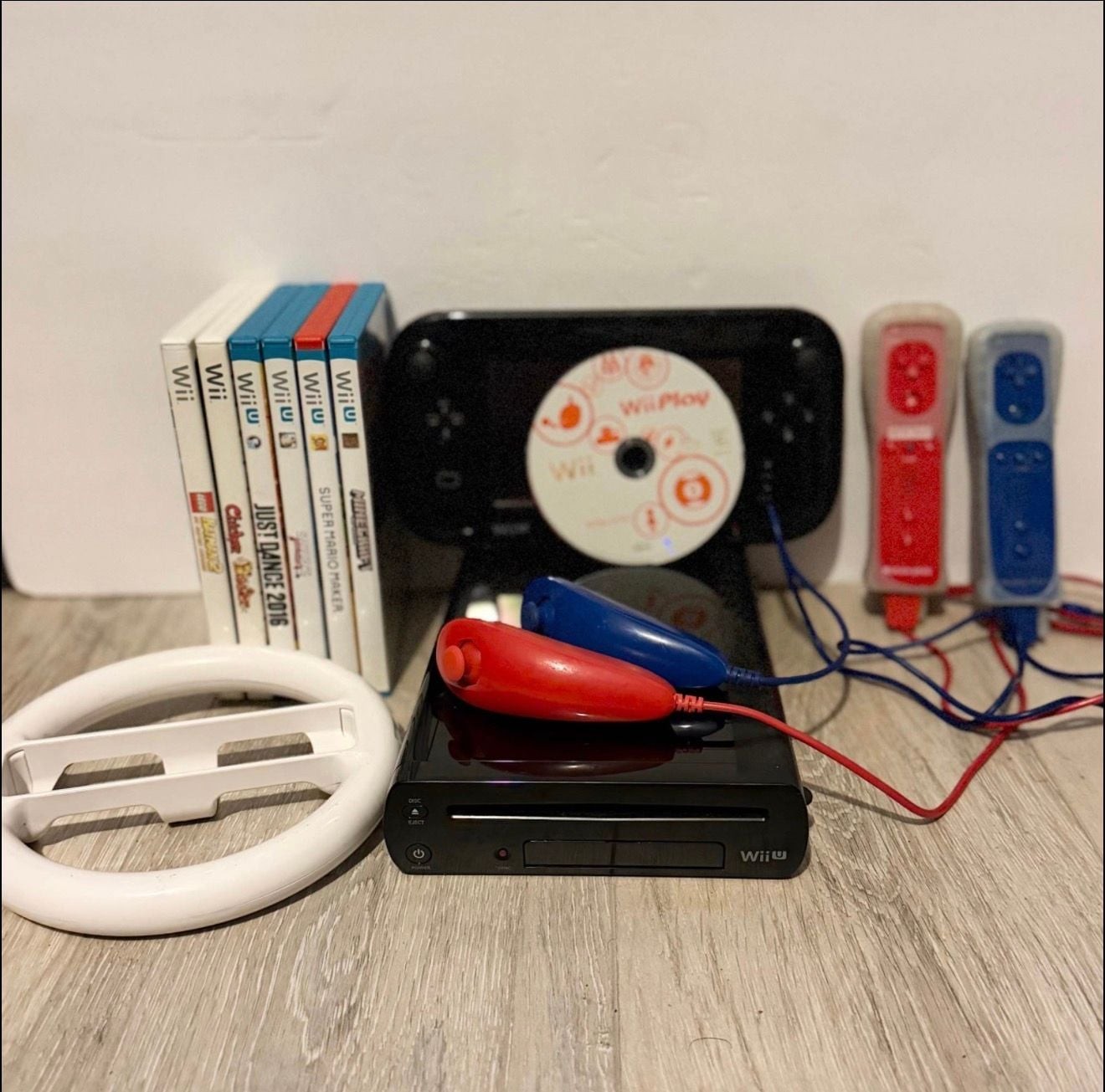 Nintendo Wii U 32GB Deluxe Console Bundle with GamePad, Wii Remotes, and Games