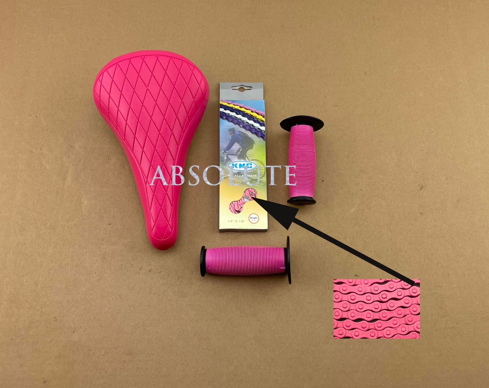 PINK DIAMOND STITCHED BMX BIKE SADDLE W/ BMX KMC CHAIN &MUSHROOM STYLE GRIPS.