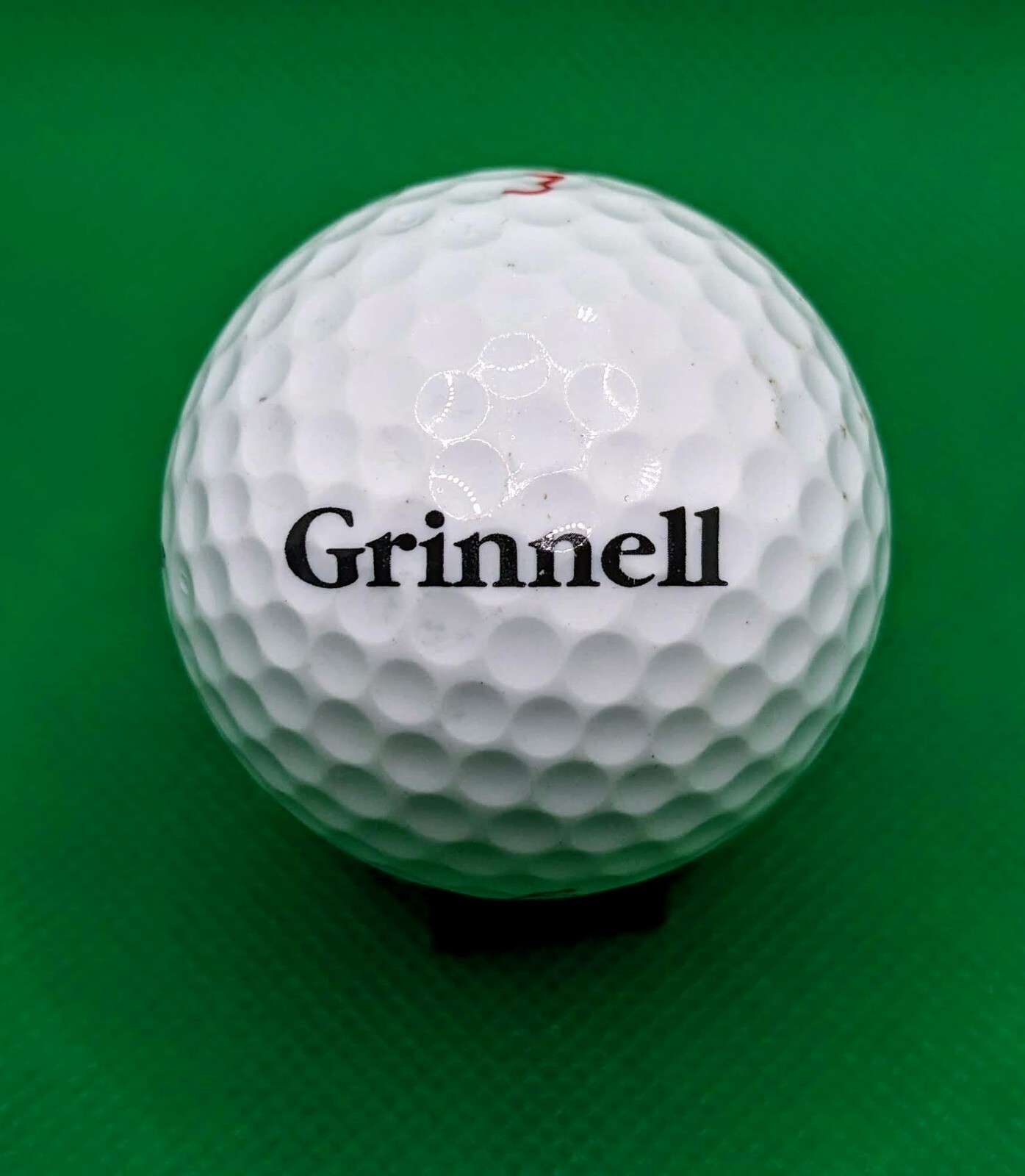 Grinnell logo golf ball