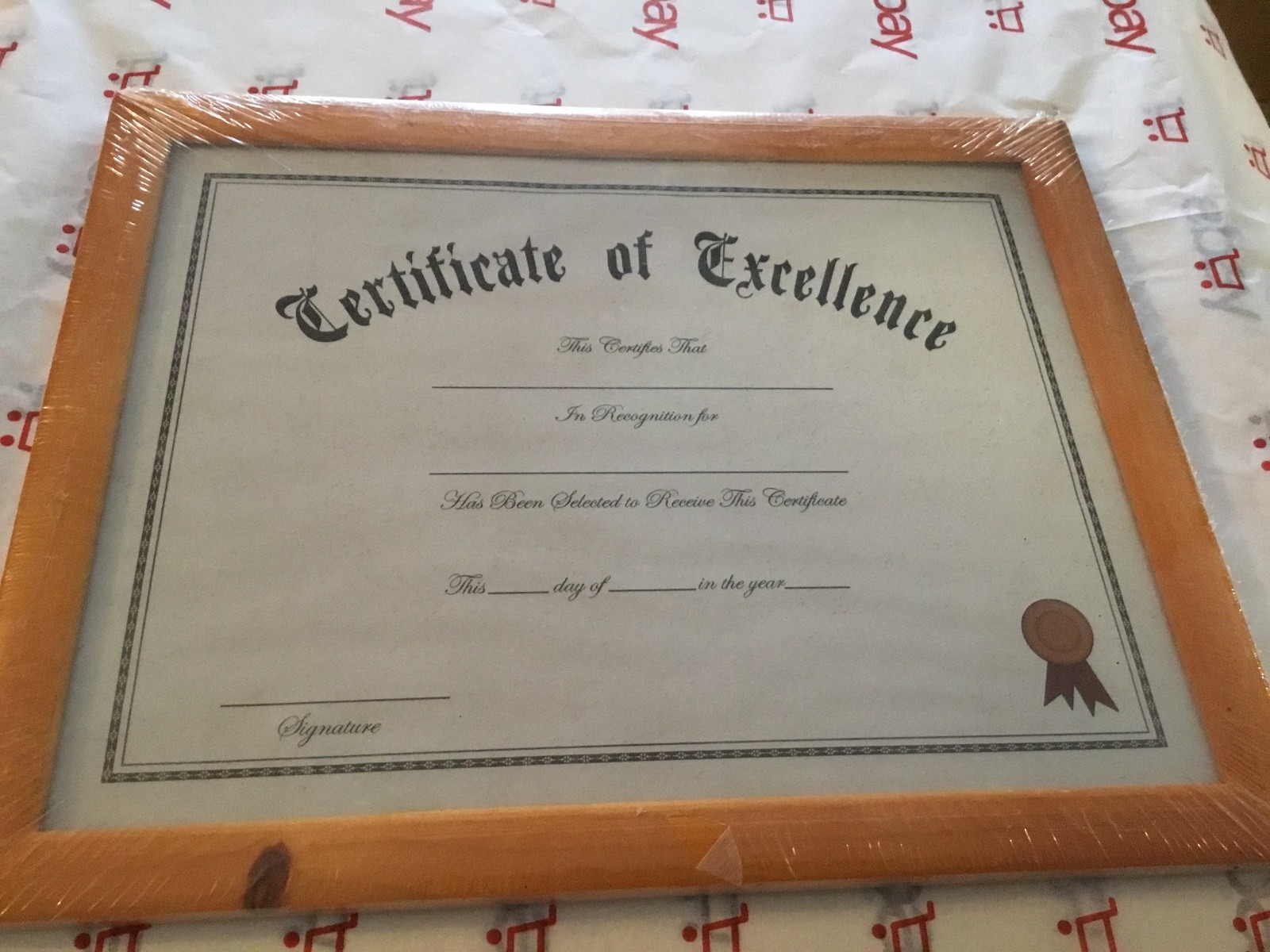 wood framed horizontal "Certificate of Excellence" award