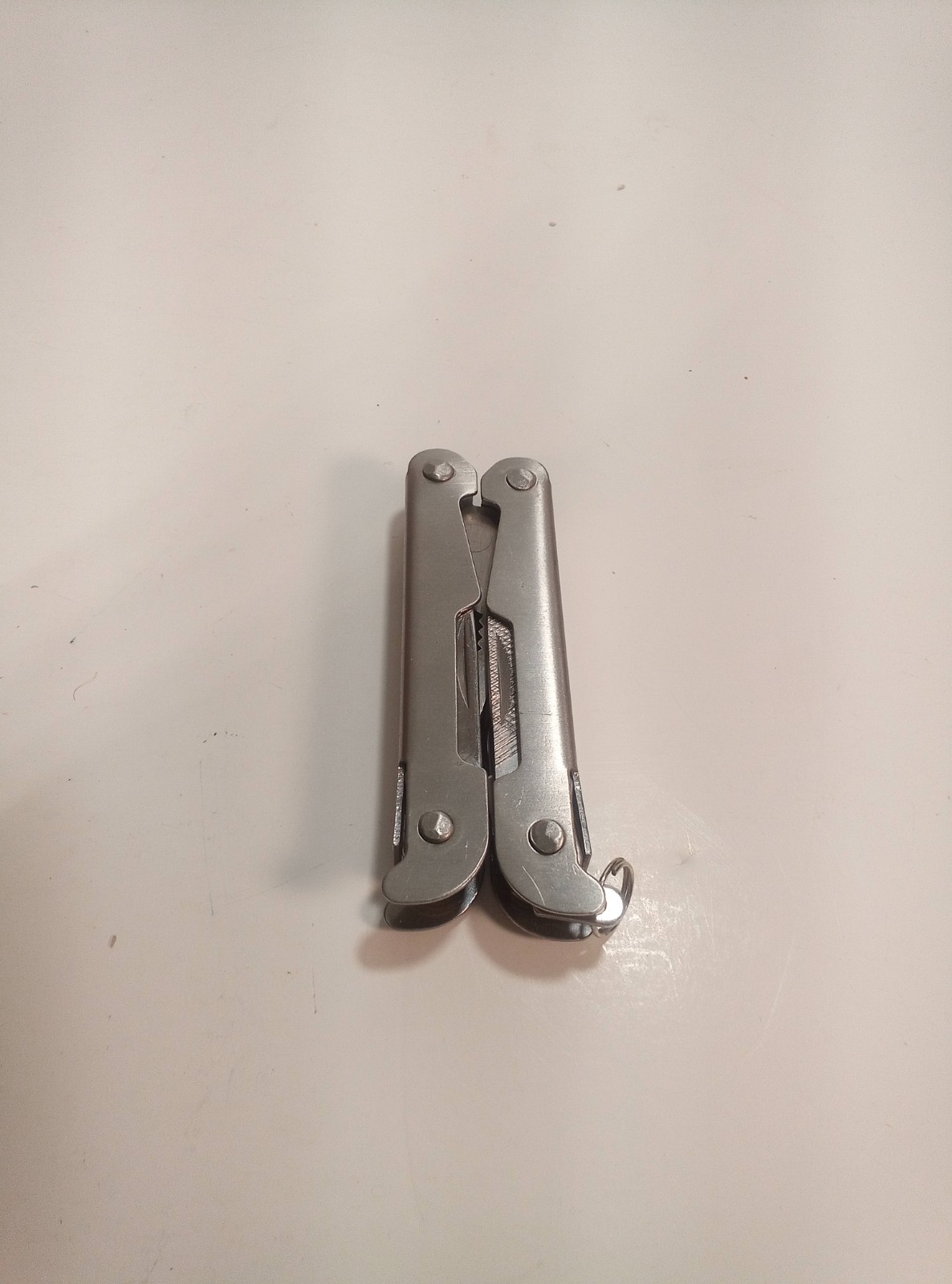 Silver Metal Multi-Tool with Pliers and Fold-Out Tools (U-10)