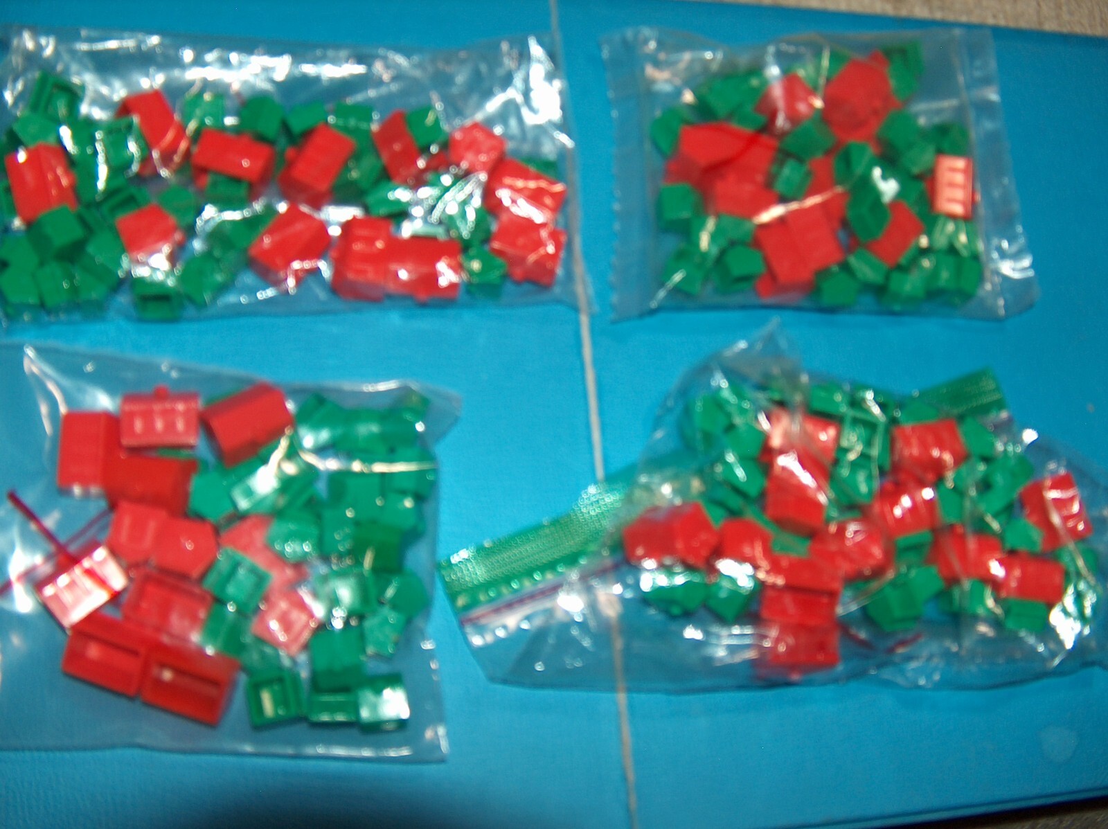 4 Sets MONOPOLY Replacement pieces parts  32 green HOUSES 12 red HOTELS