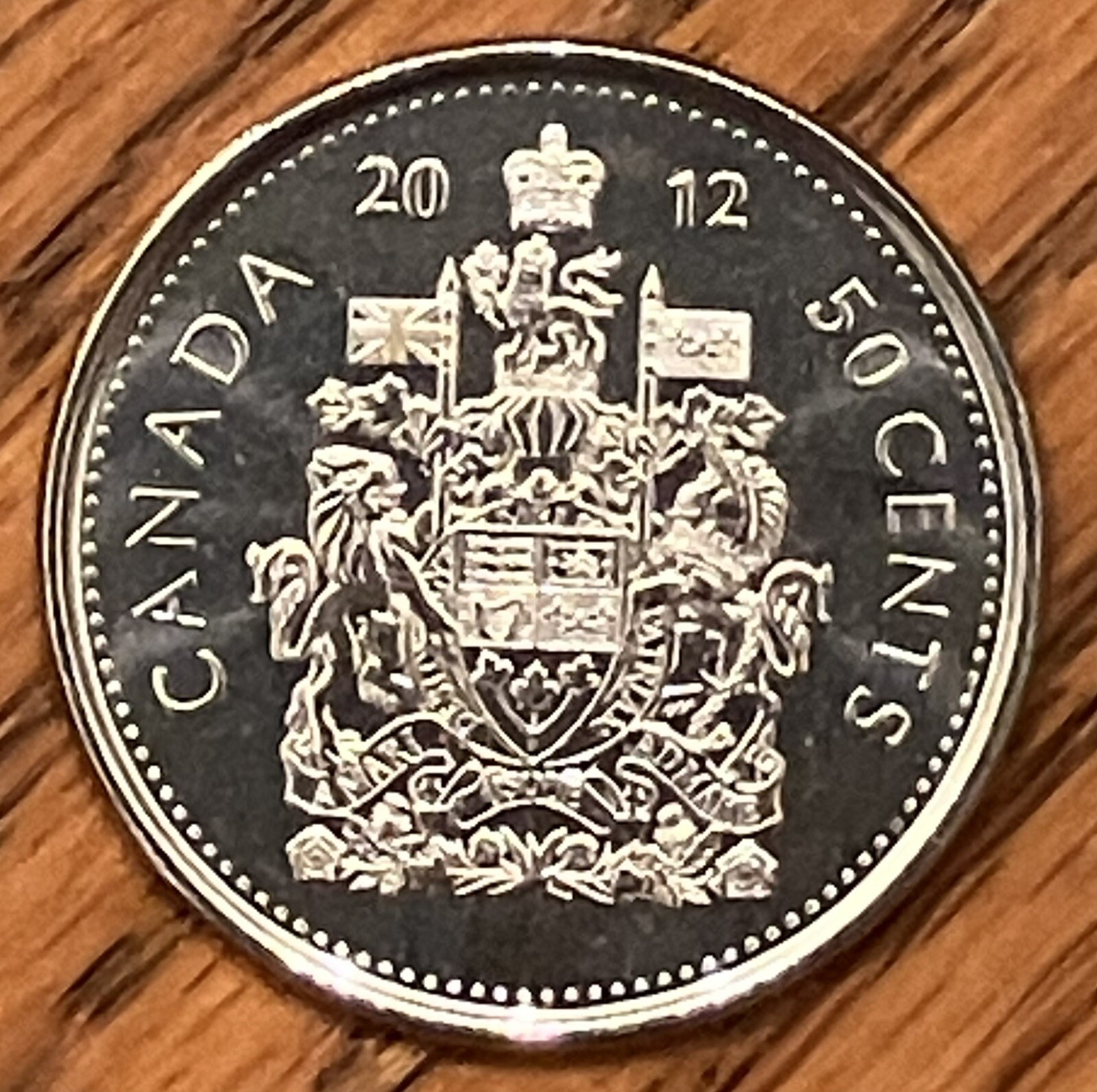 2012 Canada 50 cents UNC coin **75% combined shipping discount**