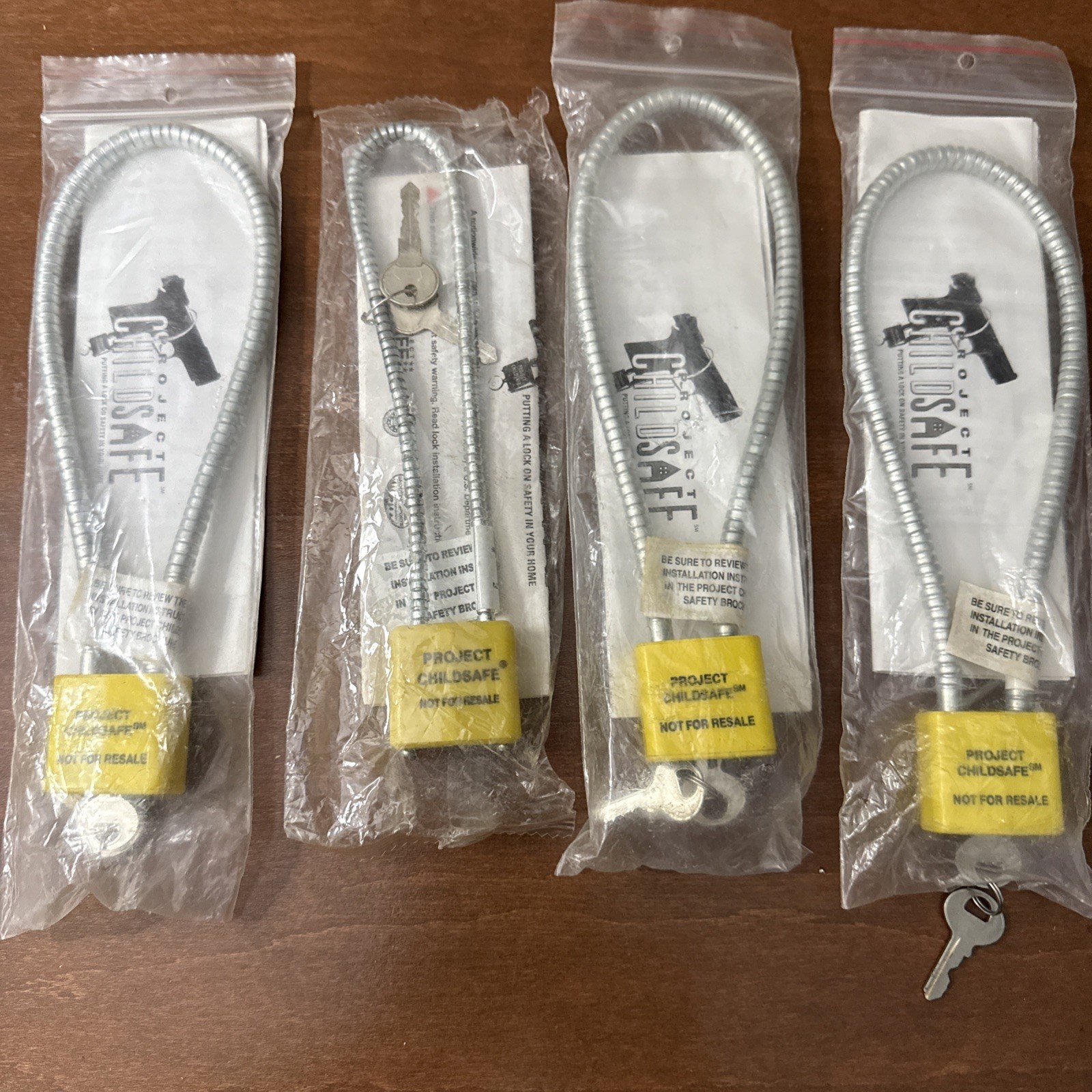 Lot of 4 Project Childsafe Gun Lock Bundle w/ Keys R1305 Silver Cable Style