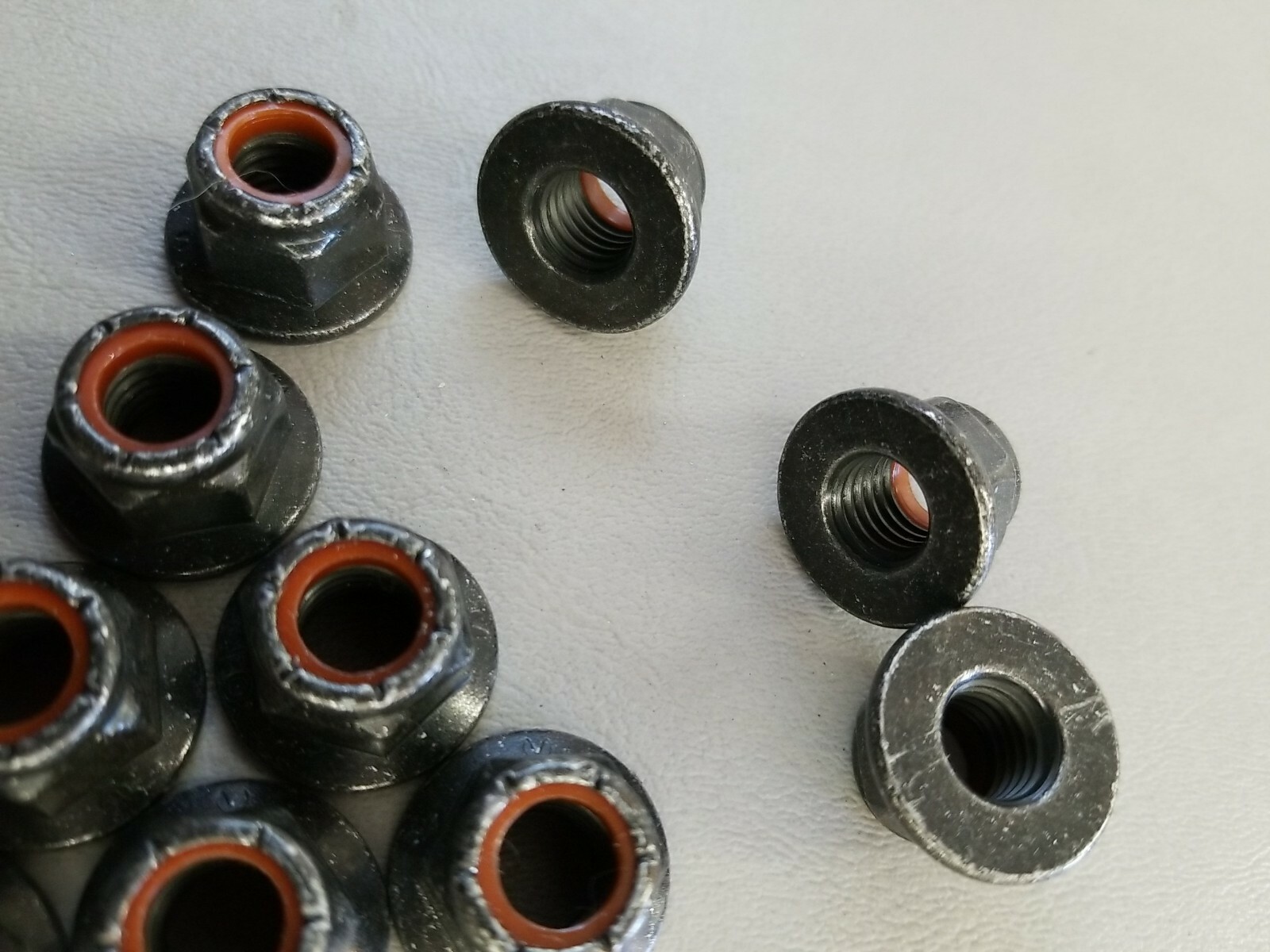 (10) M10x1.5 Hex Flange, Nylon Insert Lock Nuts CL10.9 Black Zinc