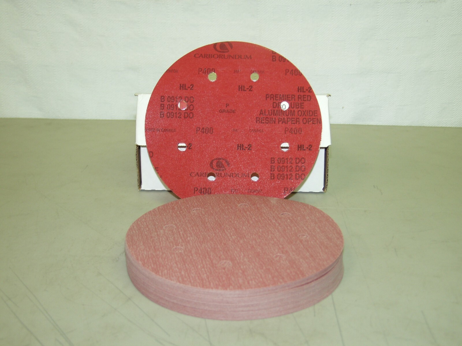 CARBORUNDUM 19380 8" 8-HOLE 400 GRIT PREM. RED STICK ON ALUMINUM OXIDE DISCS