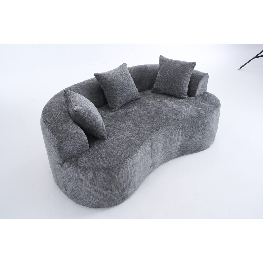 Crescent-shaped sofa, modern low-back design with deep cushions, self-inflating