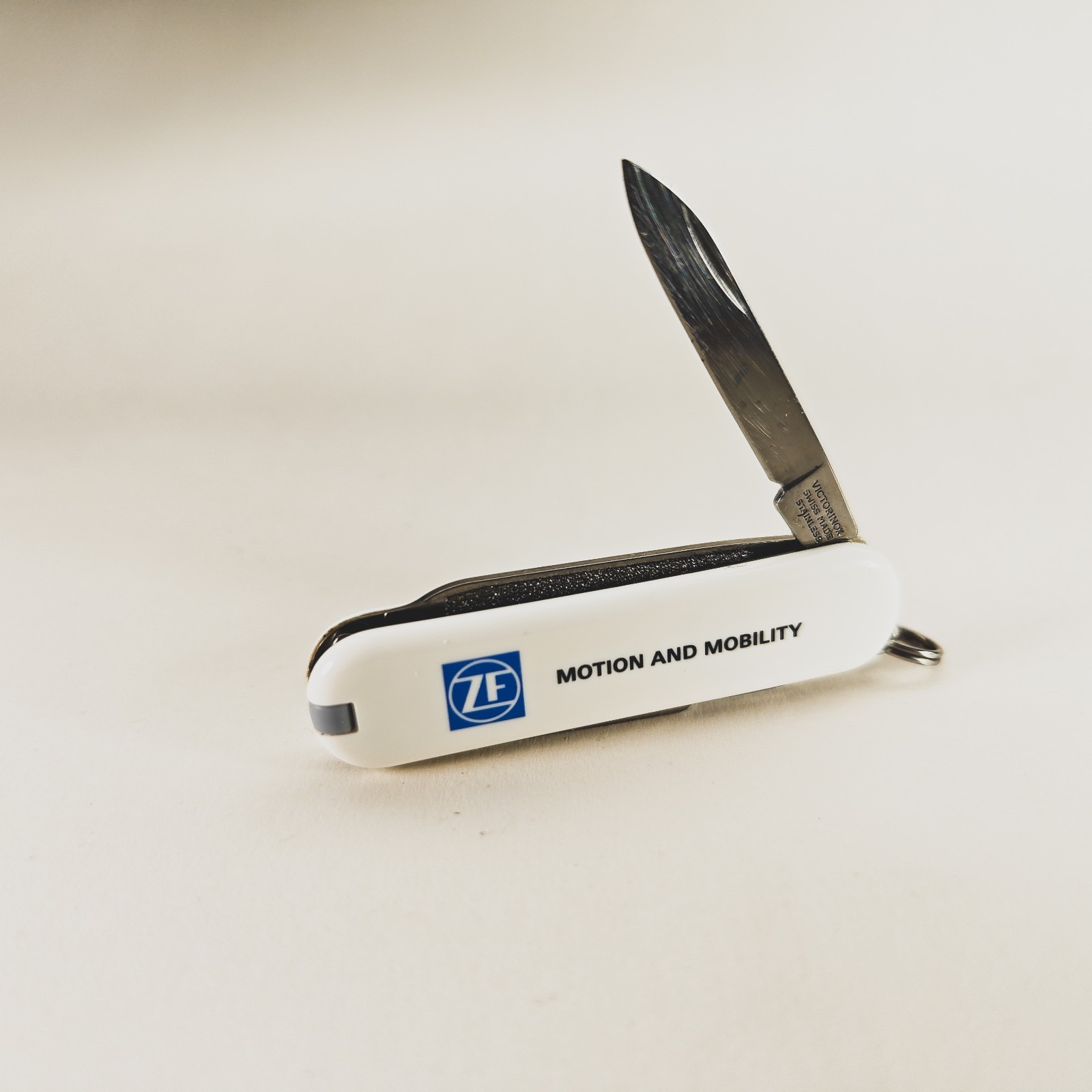 Swiss Army Knife Victorinox Classic SD 58mm White ZF MOTION AND MOBILITY Logo