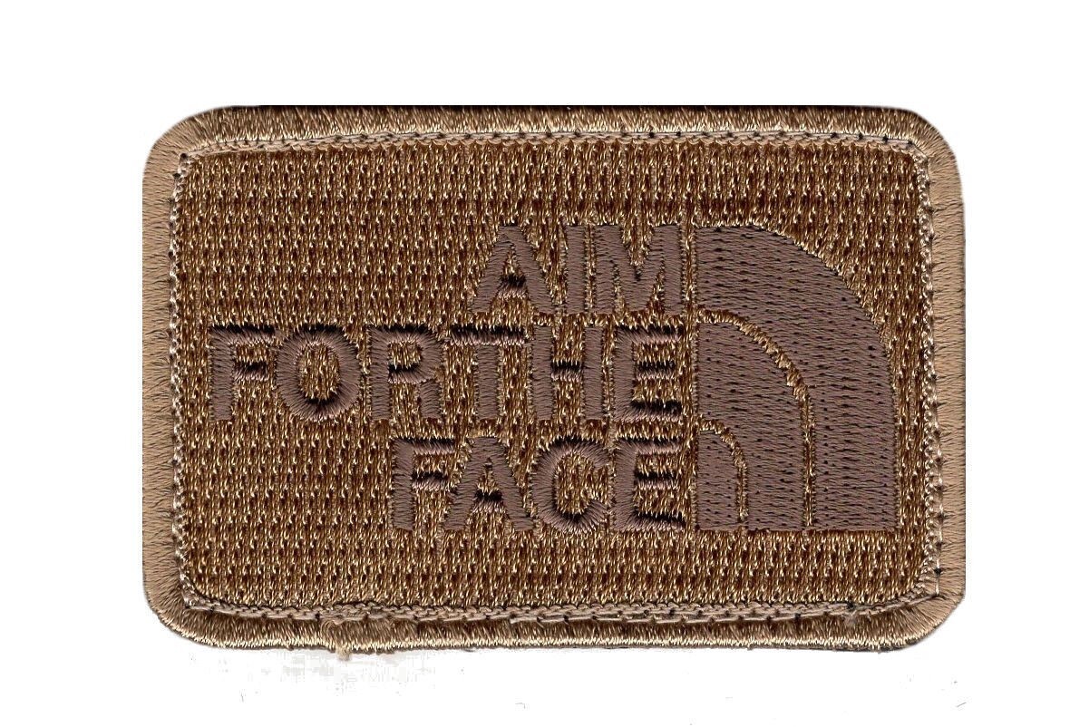 Aim for the Face Embroidered Hook Fastener patch (3.0 x 2.0 ) Tan Color