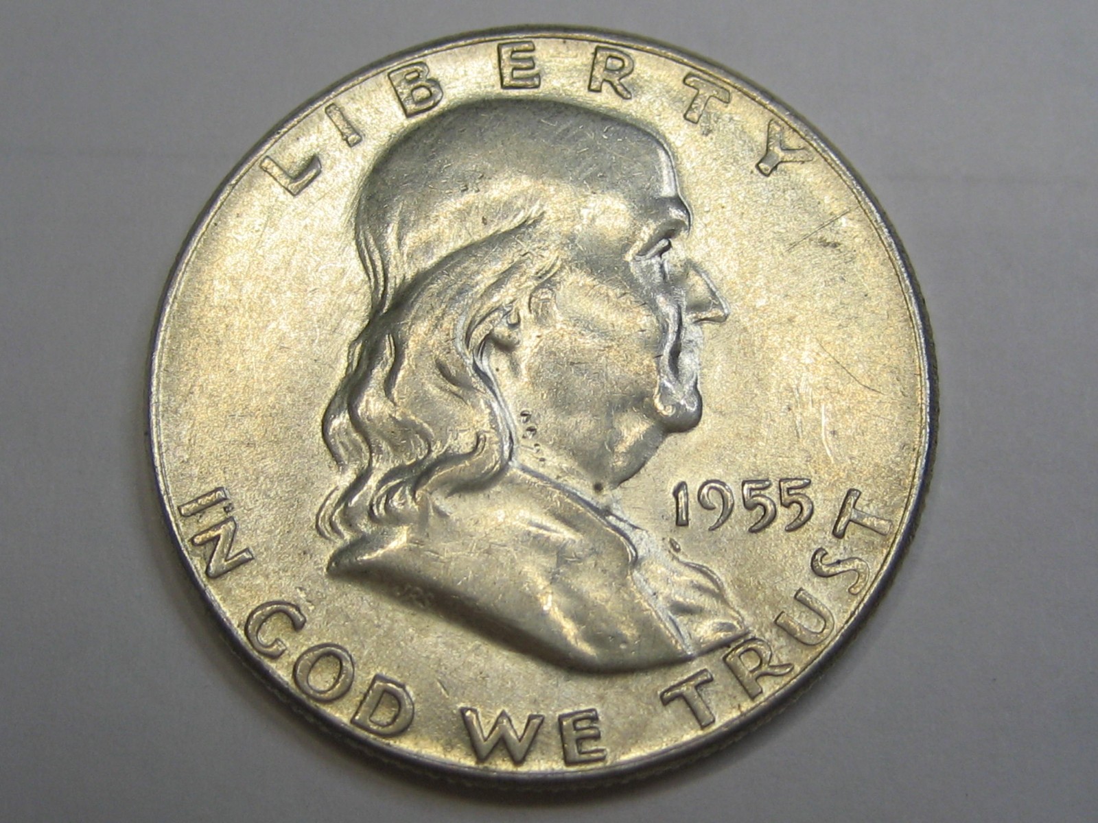 1955 Silver Half dollar "Bugs Bunny" in AU circulated condition.
