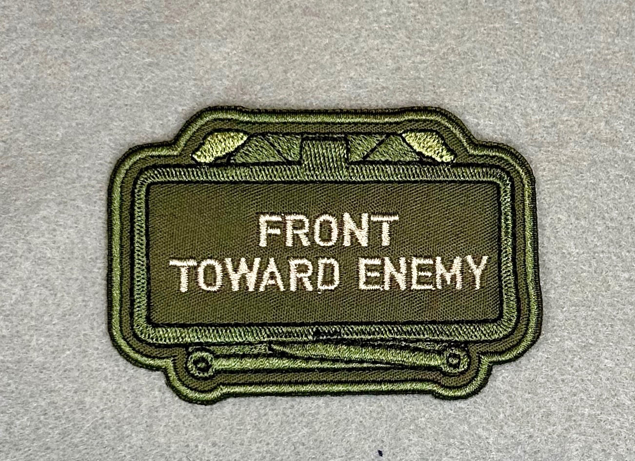 FRONT TOWARD ENEMY CLAYMORE EMBROIDERED IRON-ON PATCH...