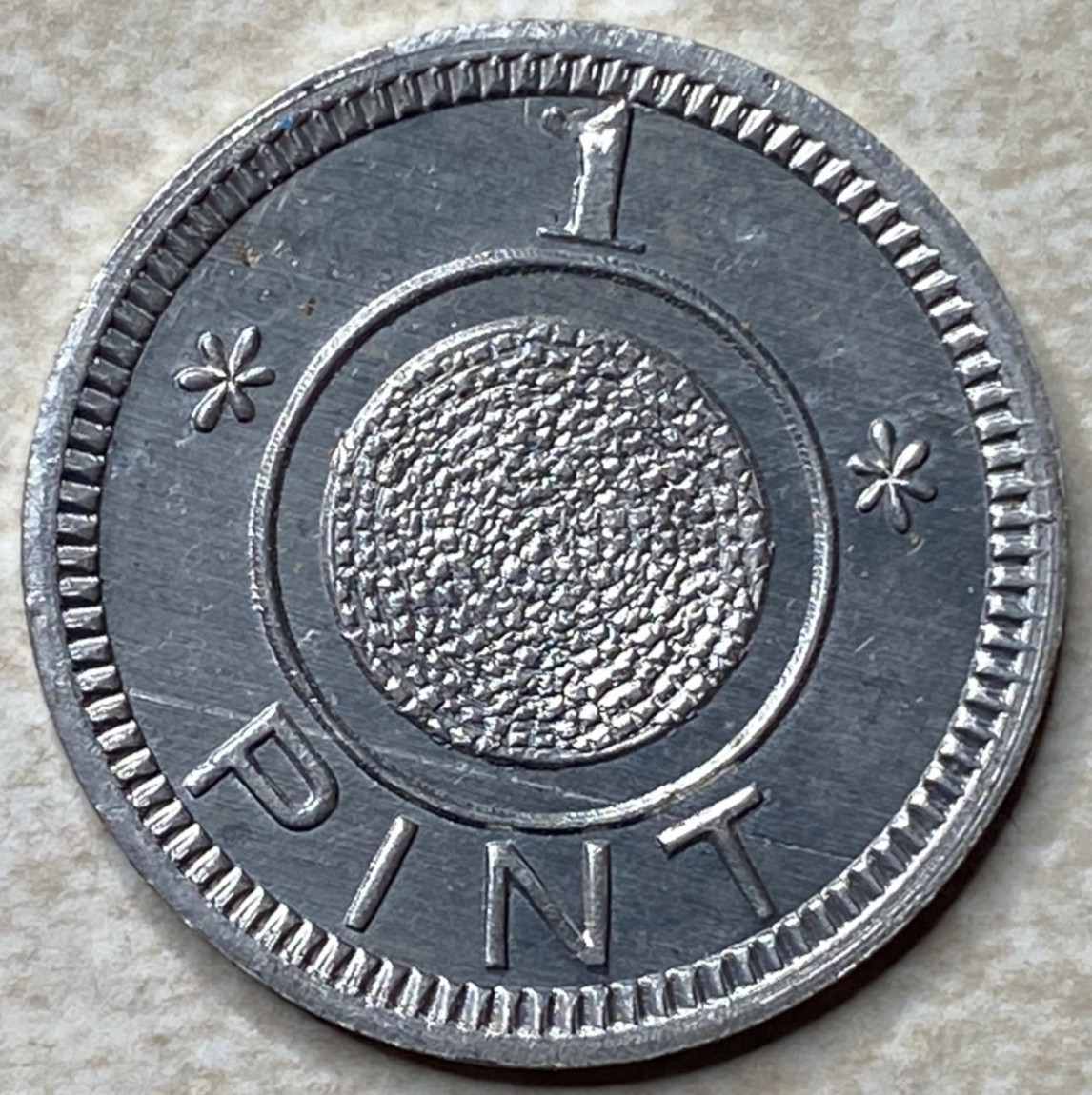 T9252 1 Pint, Unknown  Anillo Restrike Arcade Token