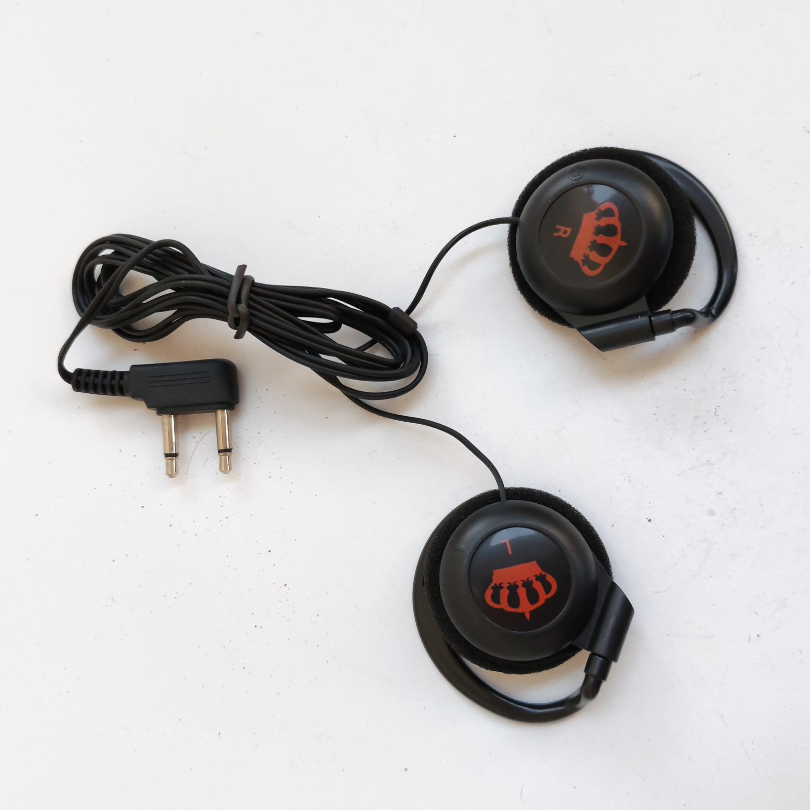 Royal Jordanian in-flight headsets featuring a dual-prong audio jack