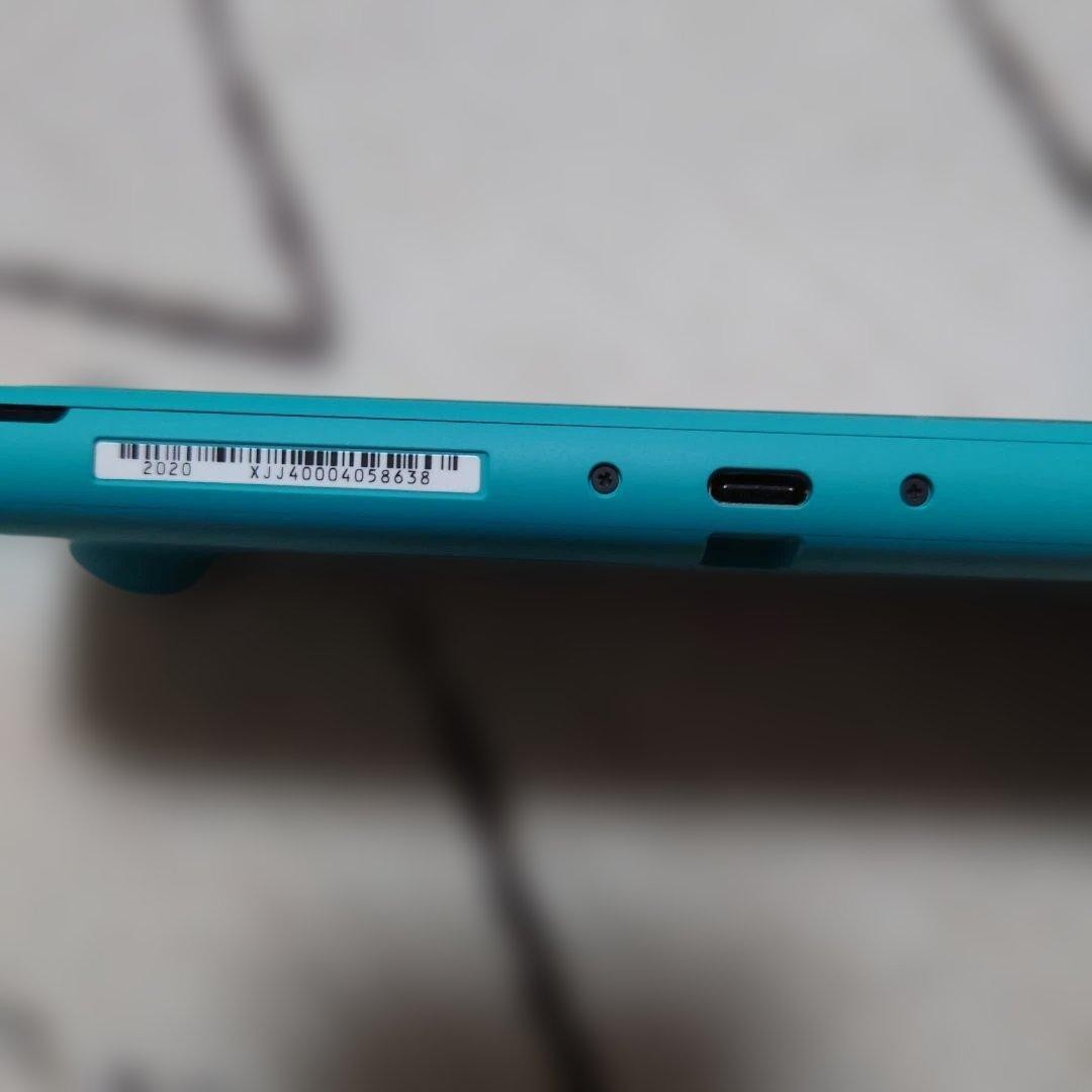 Excellent condition Nintendo Switch Lite Turquoise with Charger and Box