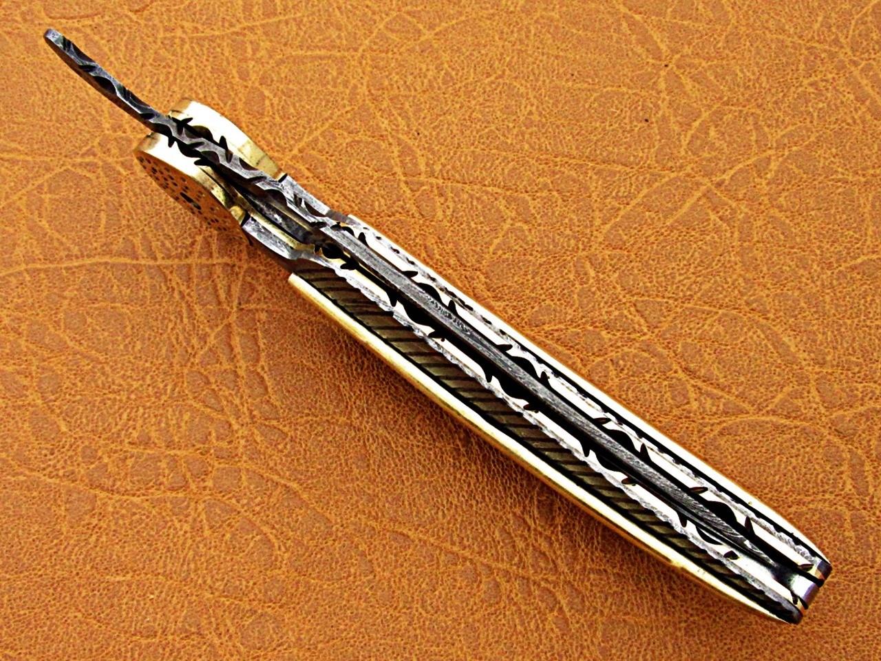 Damascus folding knife in exotic leaf shape engraved Damascus, Leather sheath