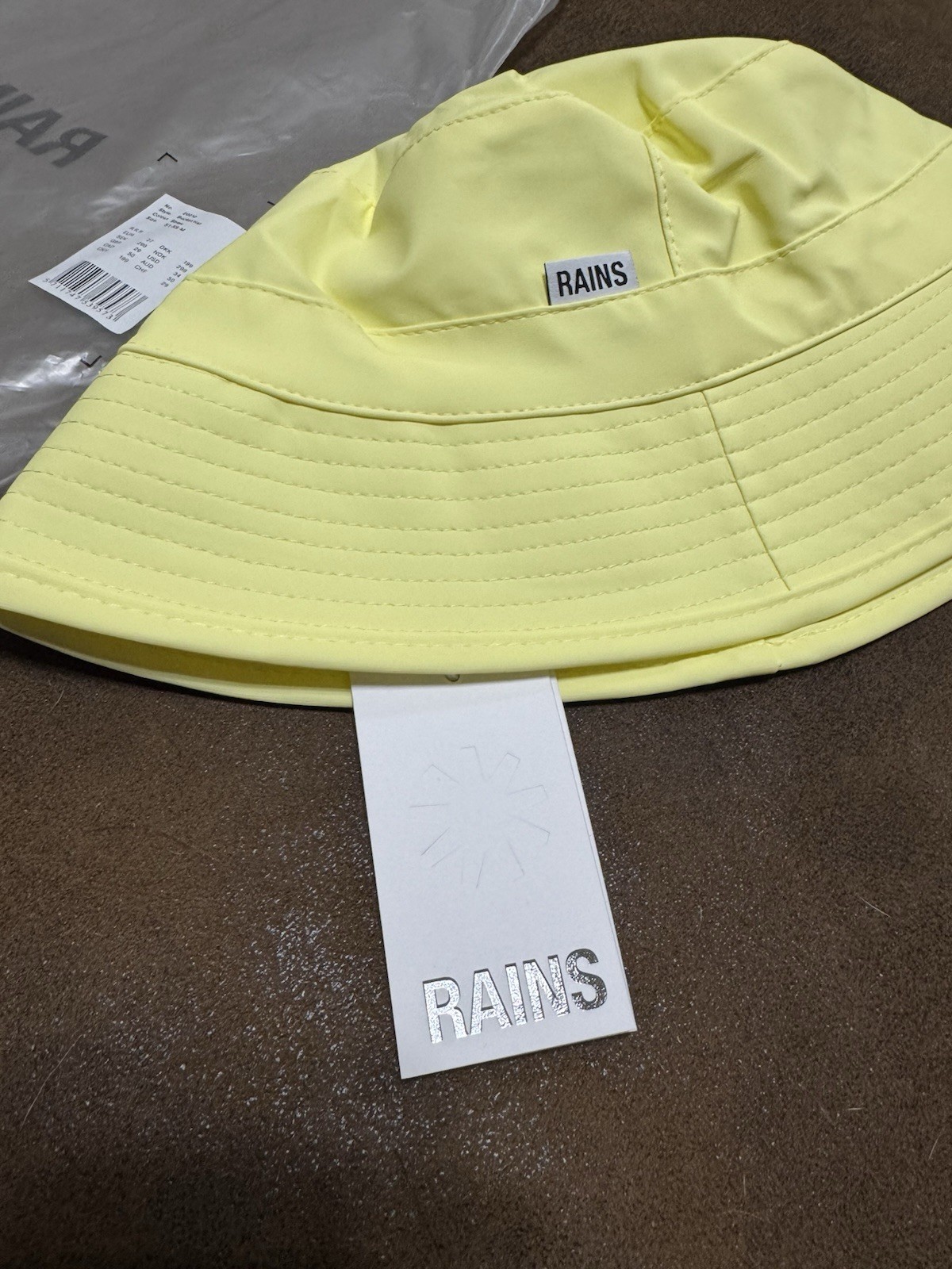 RAINS Bucket Hat Size XS - M Waterproof Straw Yellow BRAND NEW