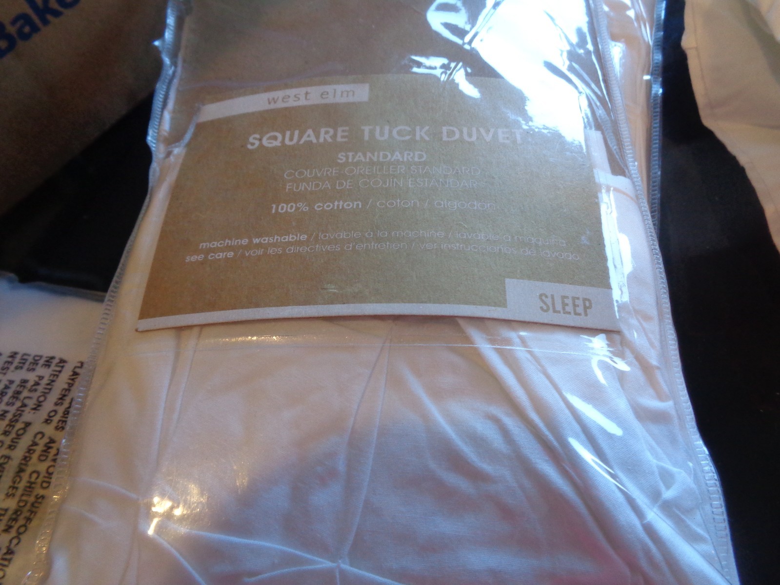 1 West Elm square tuck standard white  sham New