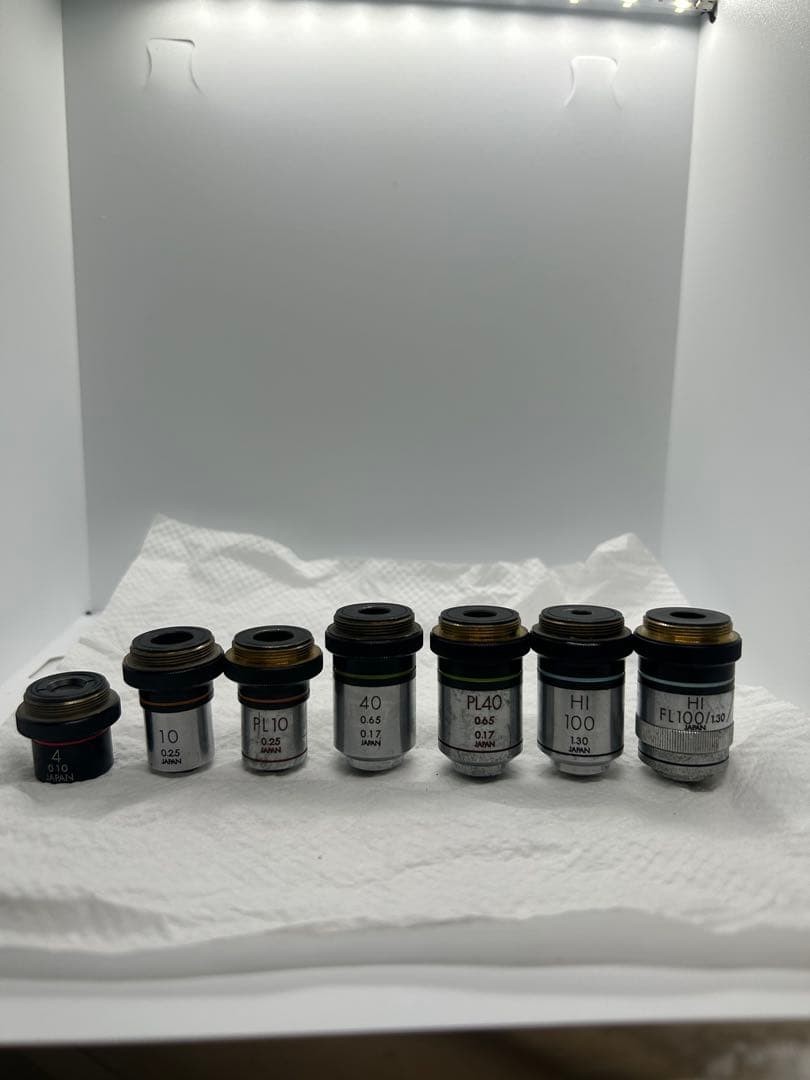 Lot of 7 Olympus Microscope Objective Lenses 4x 10x PL10 40x PL40 HI100 HI FL100