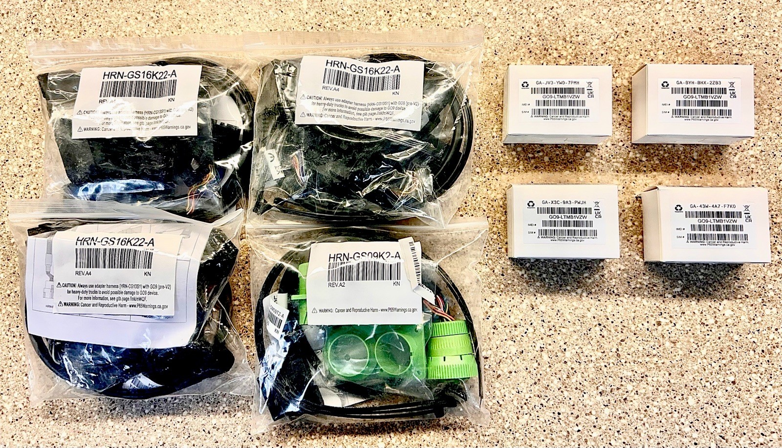 Lot of 4 NEW Geotab GO9 LTE GPS Telematics Units – 3 Light Duty + 1 HD Harness