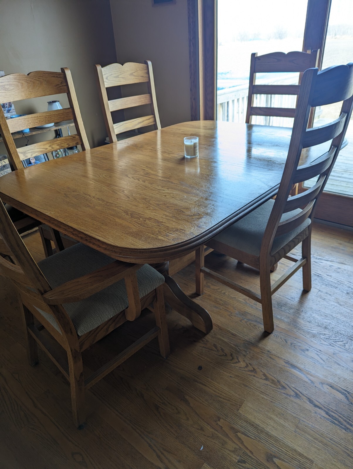 Solid wood dining room set. 5'5" closed. Opens to 9'5" with leafs.
