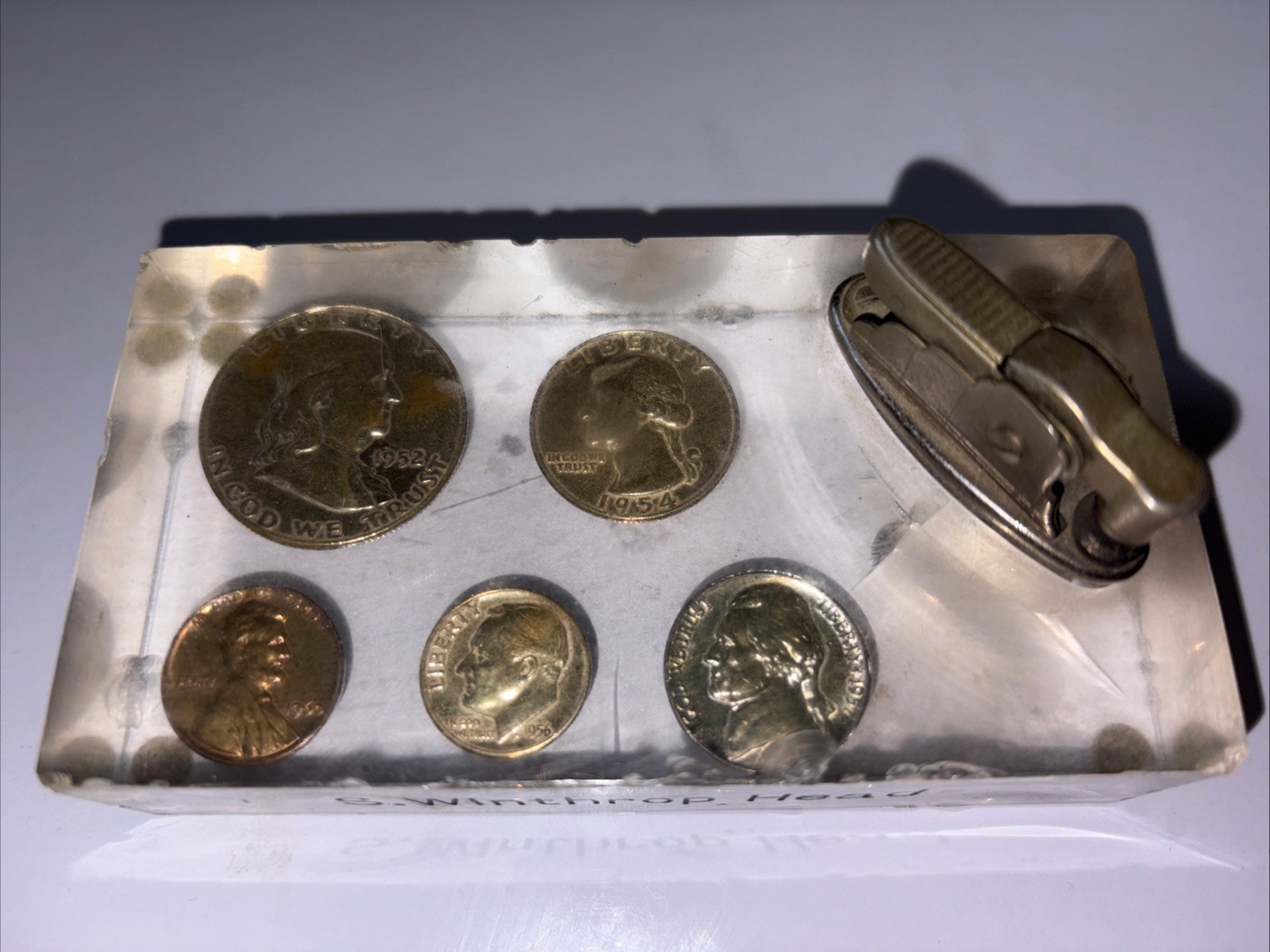 1952-1960 Coins in Lucite Paperweight As Pictured Silver Coins and A Lighter