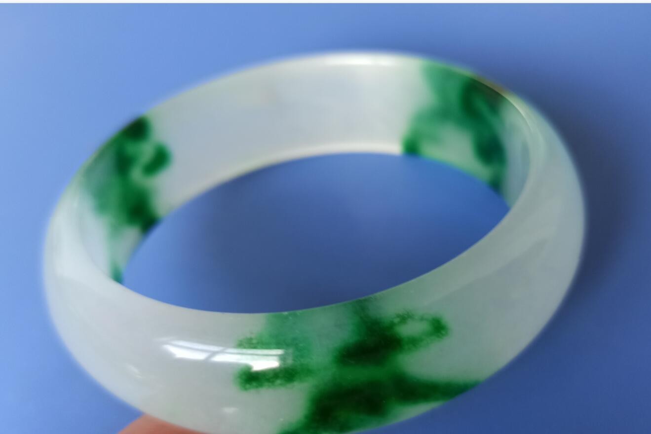 60mm Natural floating green ice bottom hard body jade bracelet