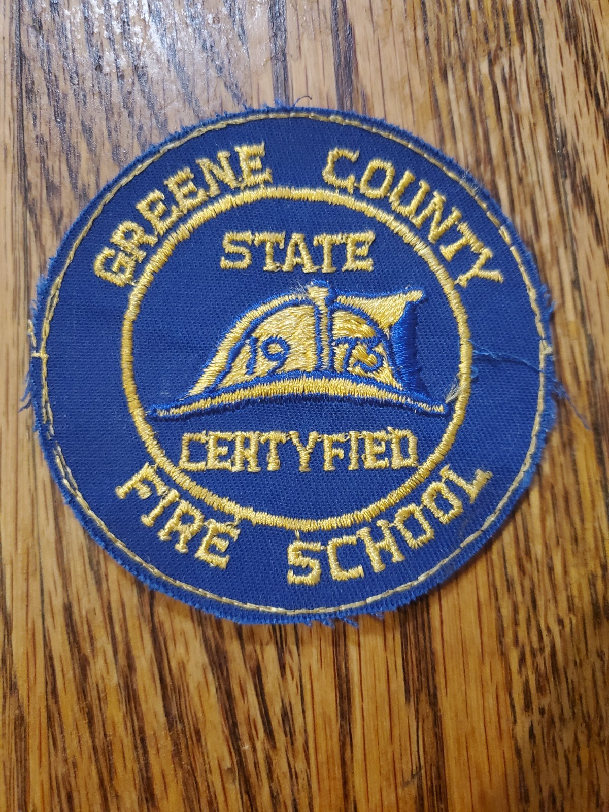 Vintage Greene County State Certified Fire School shoulder patch from 1975.