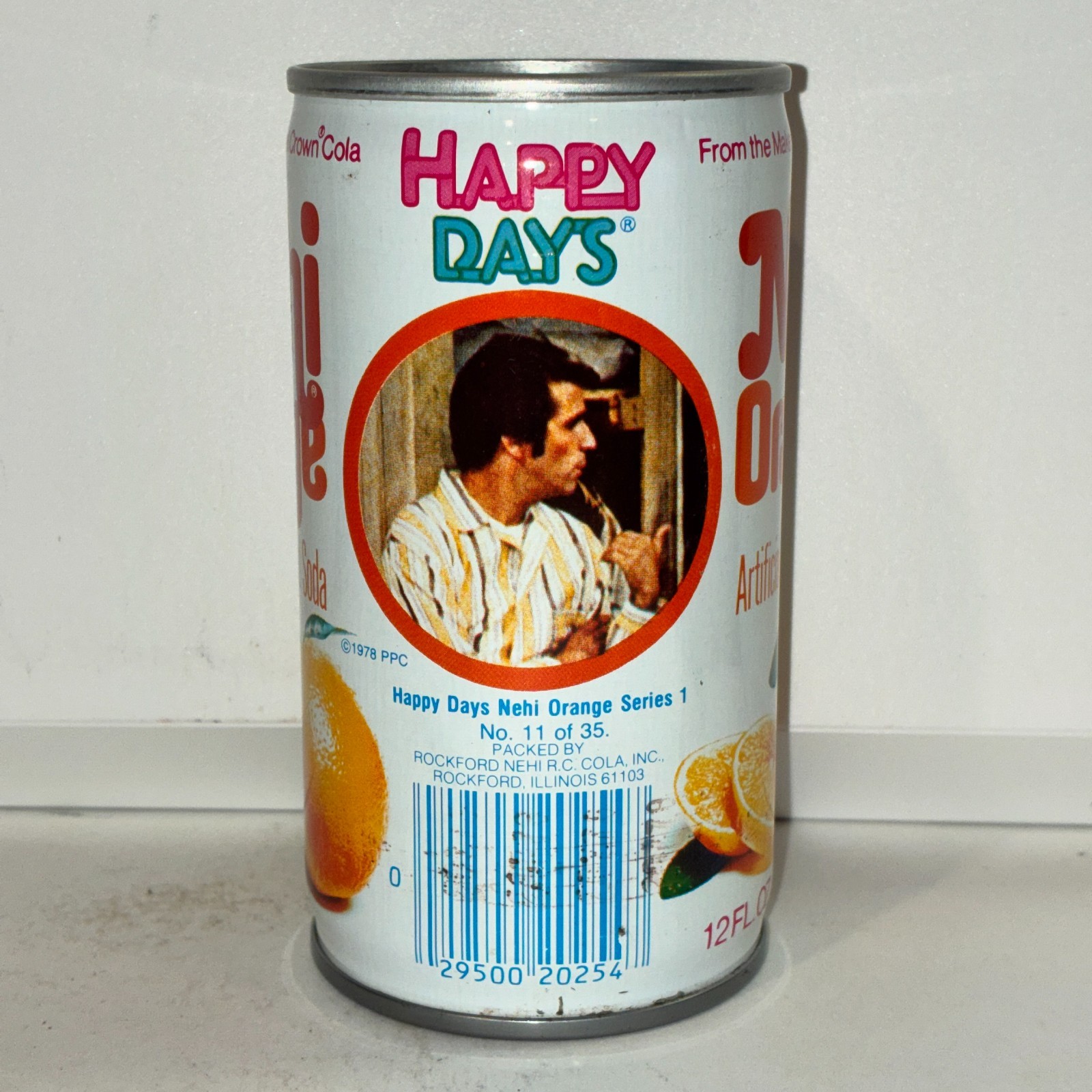 1970's Nehi Happy Days Orange Soda can, #11, bottom opened