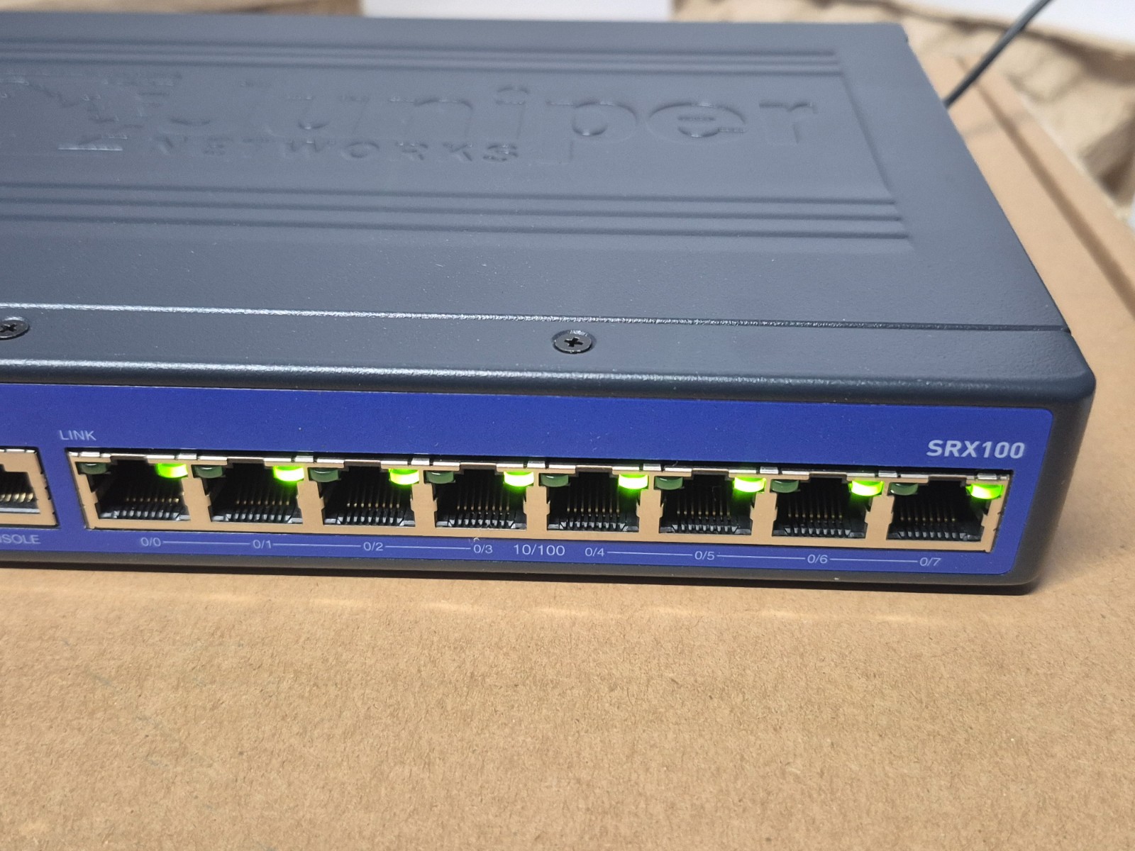 Juniper Networks SRX-100 Services Gateway Firewall SRX100H2 8-Port Open Box