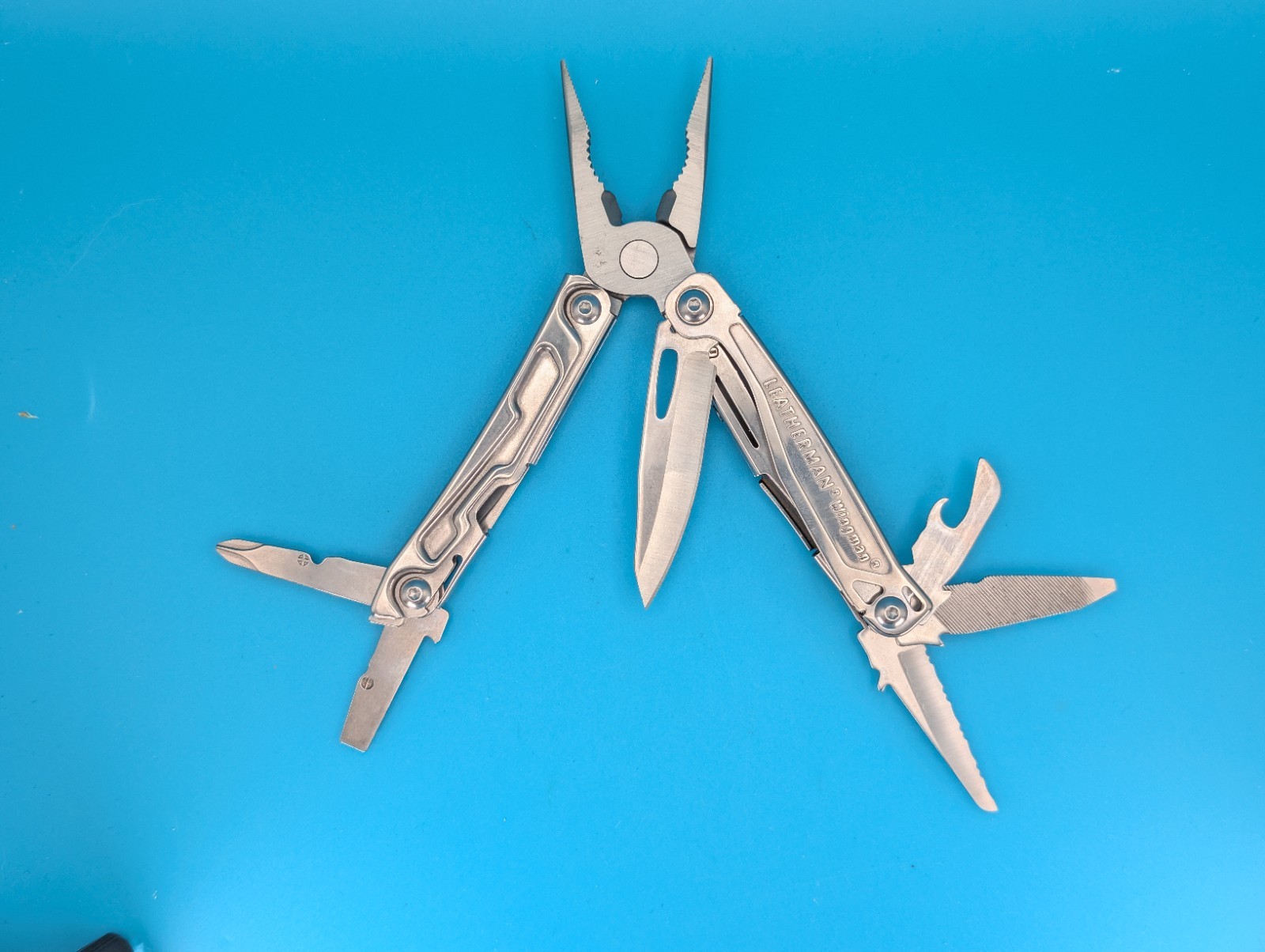 Leatherman Rev 3.8" Multi-Tool, Stainless! *LEATHERMAN FACTORY ERROR* WINGMAN