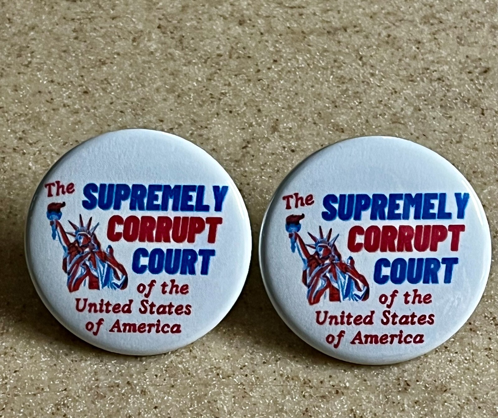 Anti Supreme Court Pin-Backs 2-pack "Supremely Corrupt Court"  1 1/2inch
