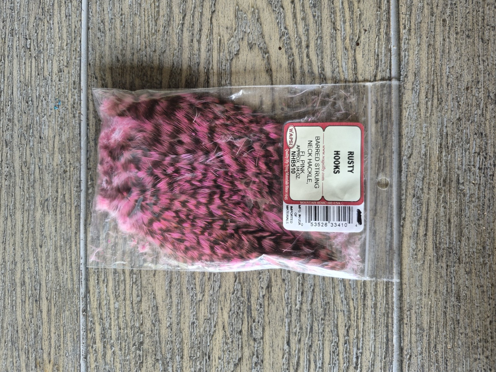 wapsi fly tying materials Barred Strung Neck Hackle Fluorescent Pink 1/4 Ounce.