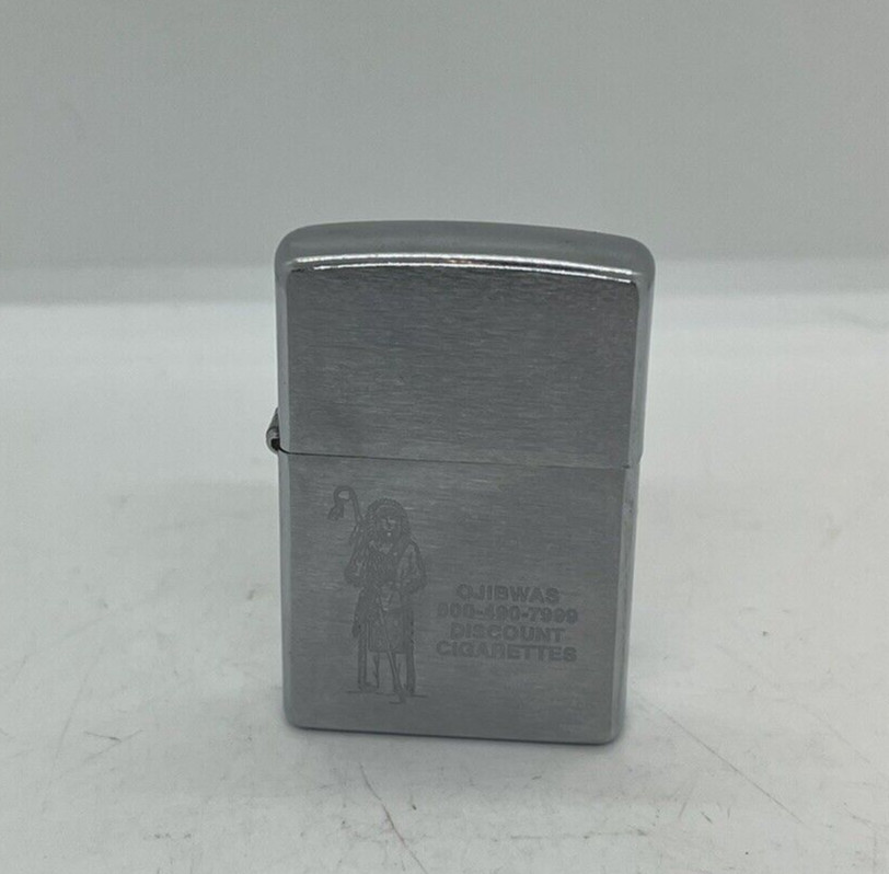 VINTAGE ZIPPO C 07 OJIBWAS DISCOUNT CIGARETTES BRADFORD P.A. LIGHTER