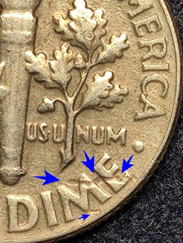 1966 Roosevelt Dime with a strike through circulated