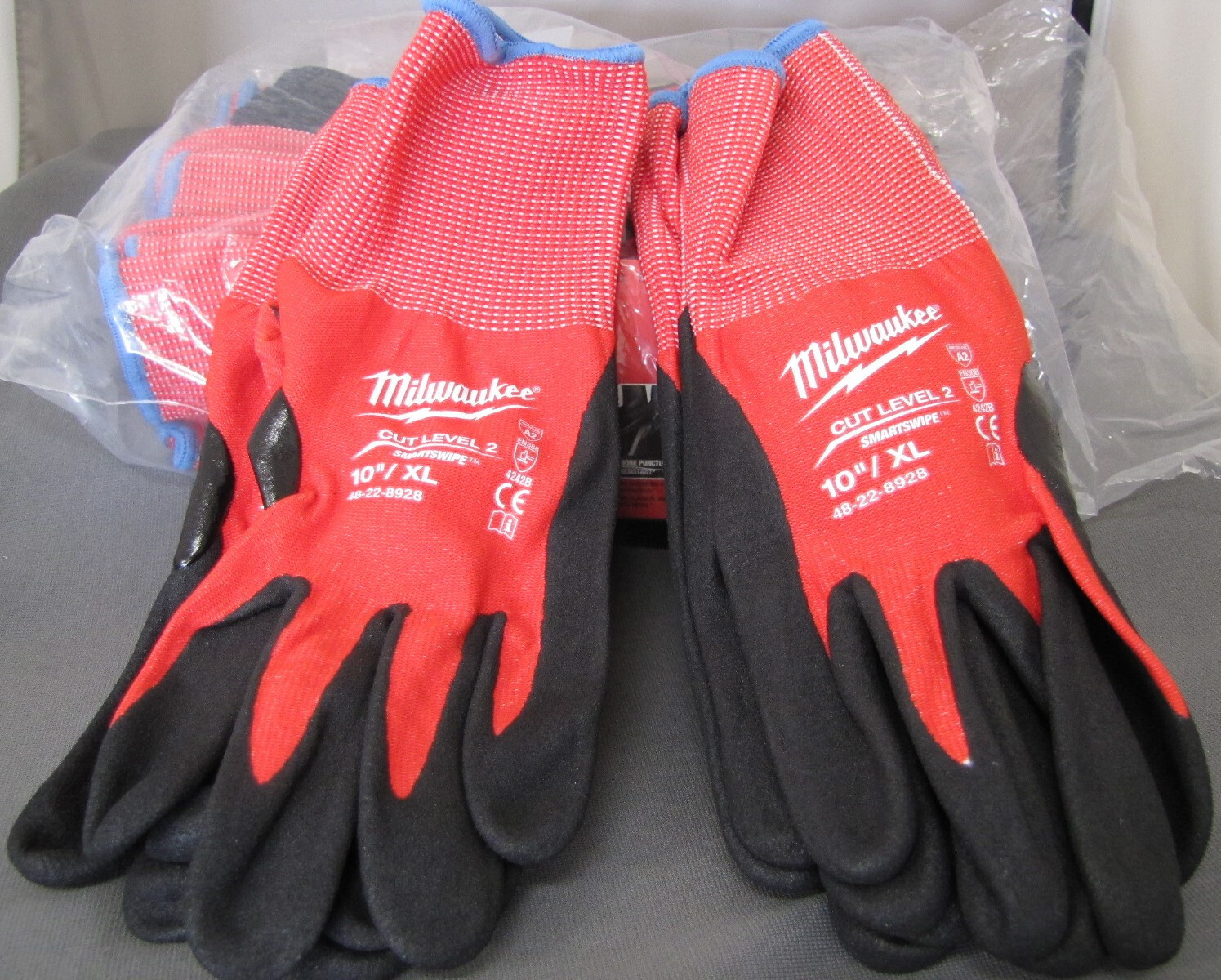 2  Milwaukee 2 Cut Level  2 latex dipped work gloves 48-22-8928 Xlarge size
