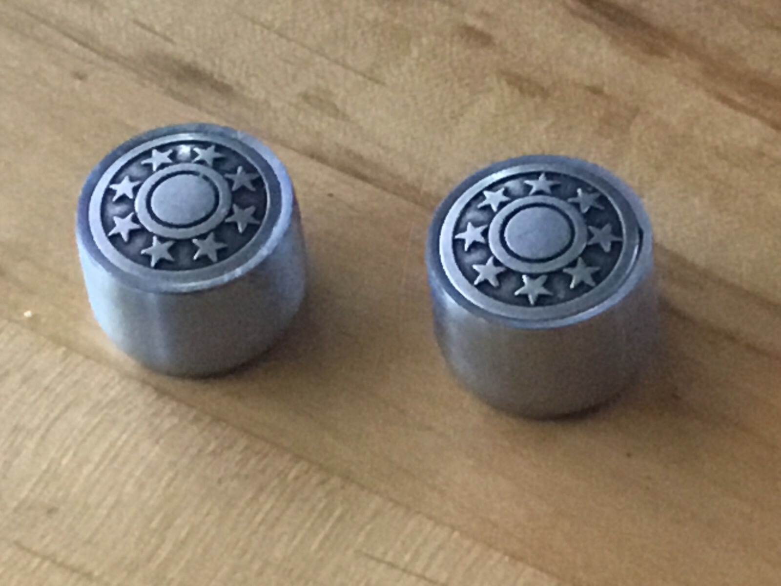 Round Star guitar knobs.