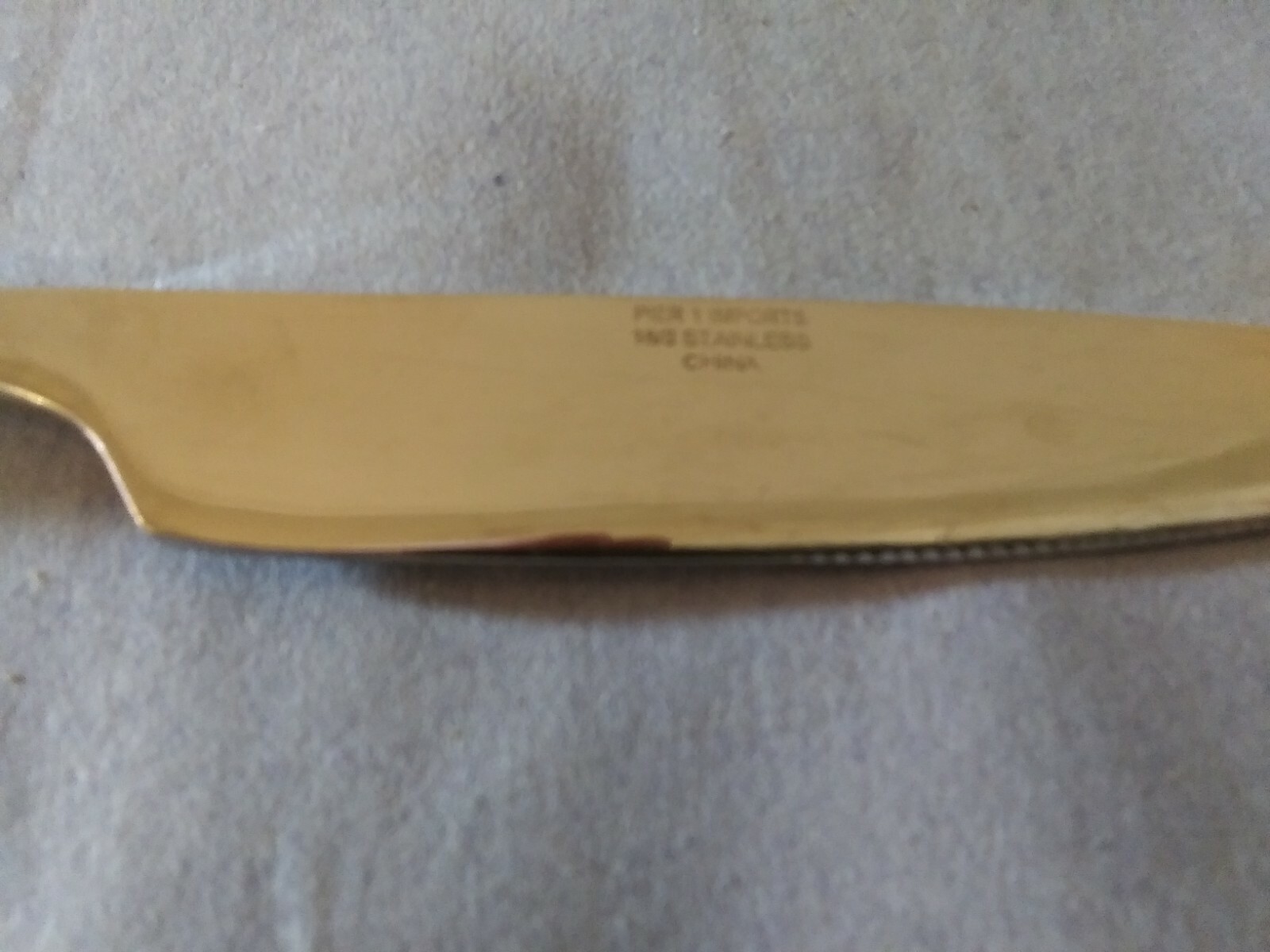 Pier 1 Wavy stainless 9" solid handle dinner knife