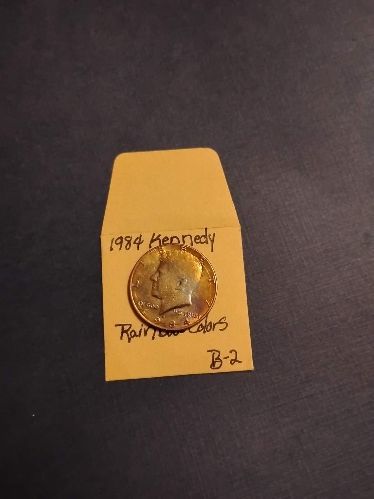 1984 P Kennedy Half Dollar Monster Toning. Outstanding Hues and Vibrant Colors.