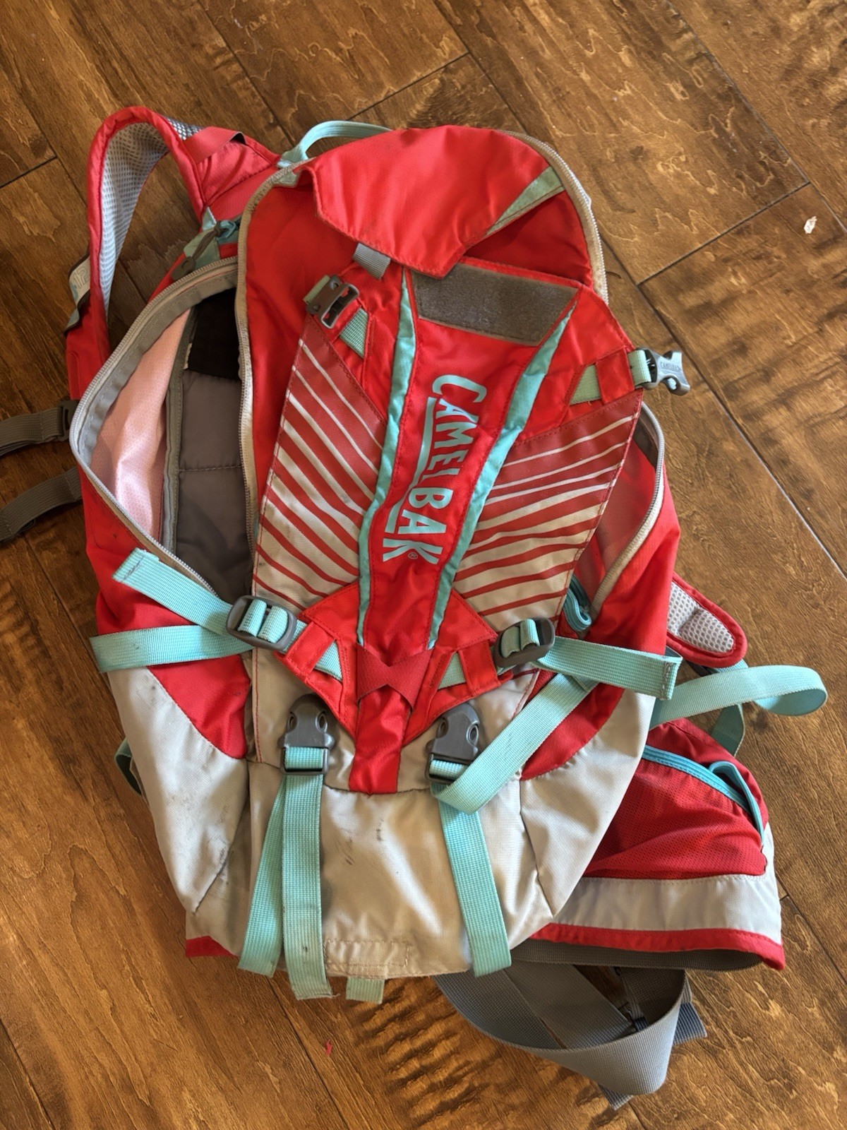CamelBak K.U.D.U. 12 L Hydration Pack Fiery Red & Silver for Climbing & Cycling