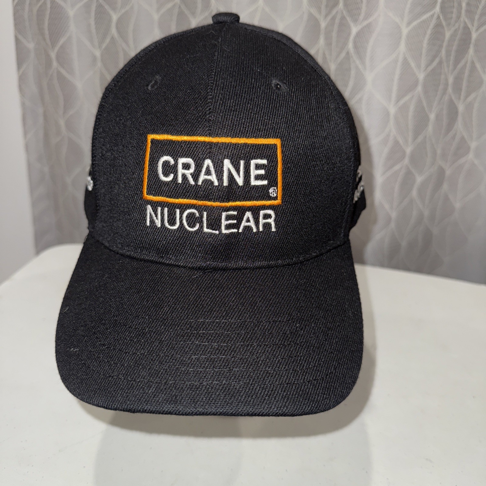 Crane Nuclear Black Hat Cap w Orange Rectangle and White Letters Hook Loop EUC