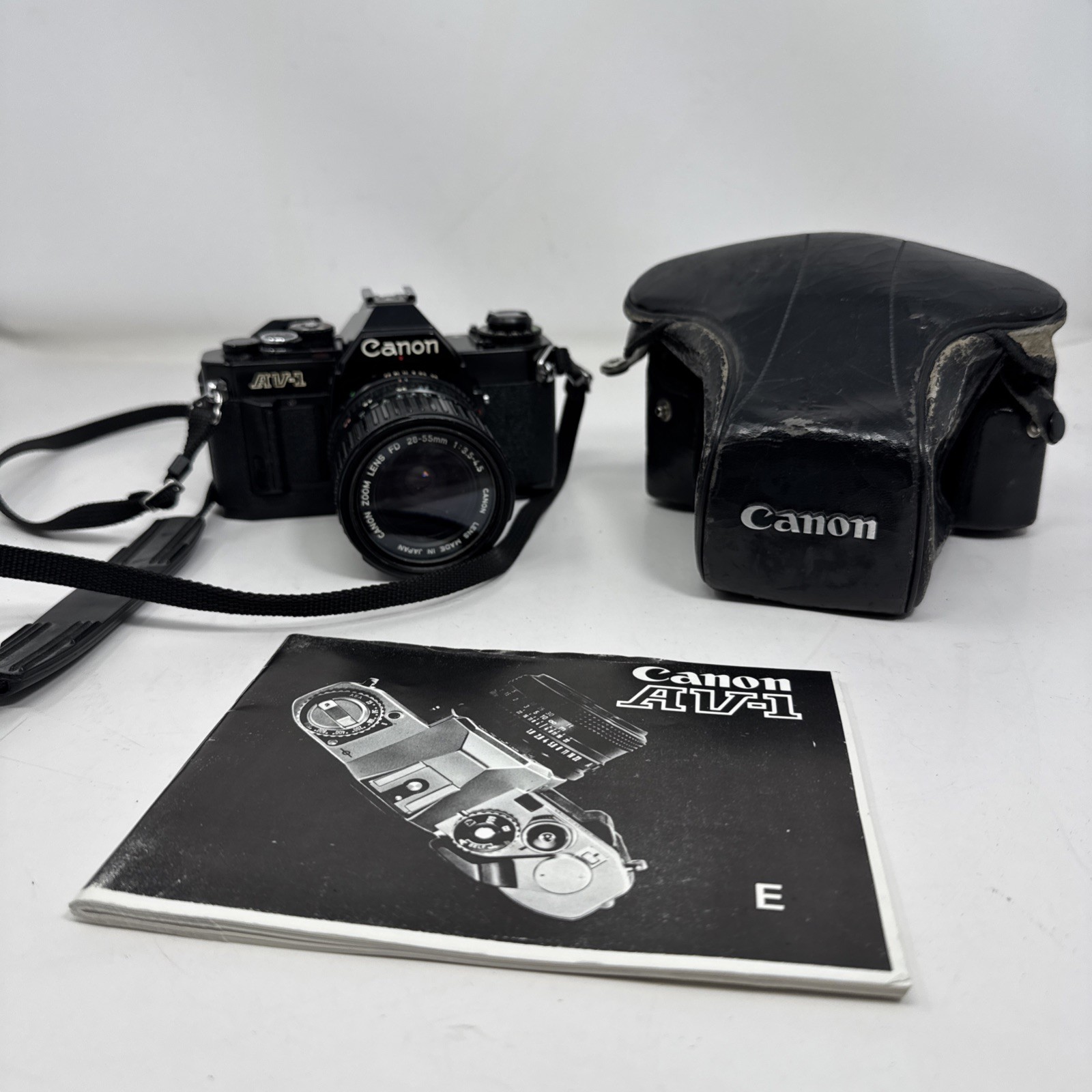 Canon AV-1 35mm SLR Film Camera w/ Canon FD  lens 28-55mm 3.5-4.5 Lens + Case
