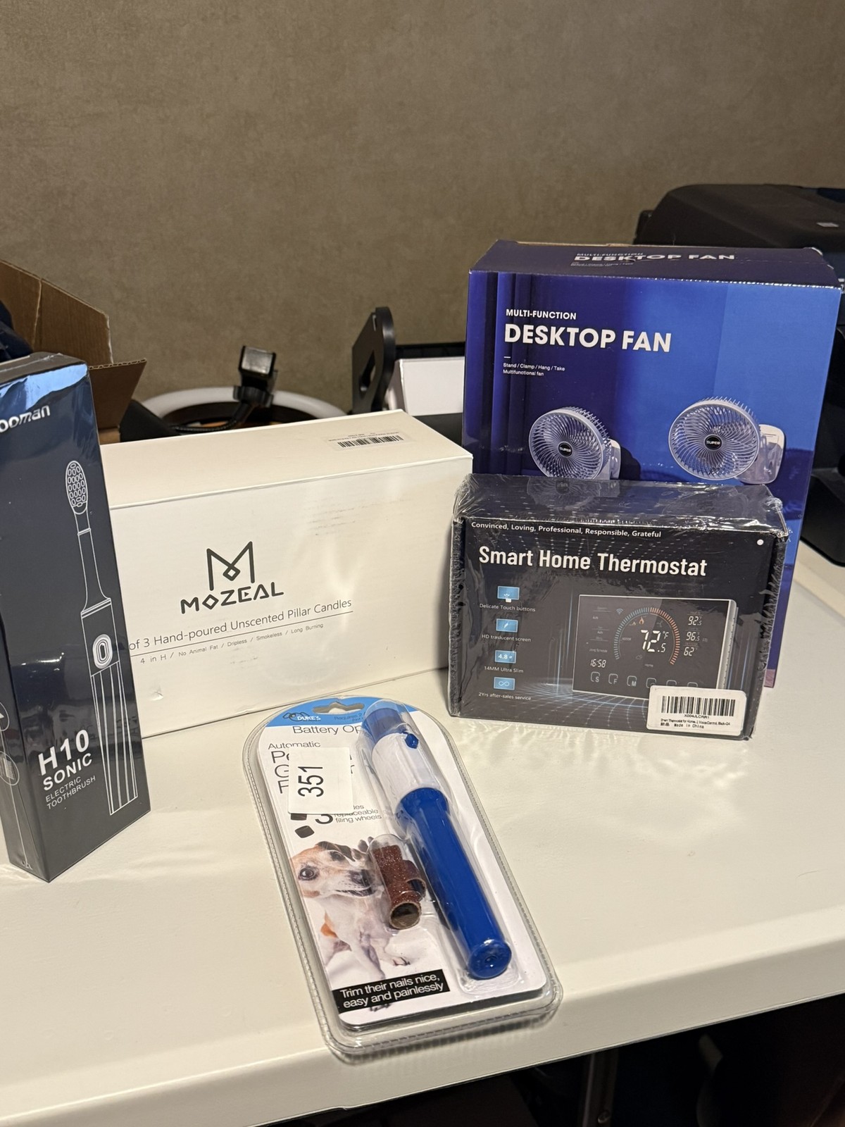 CLEARANCE:  Bundle 5: Smart Thermostat, Candles,  Toothbrush, Dog Nail Trimmer