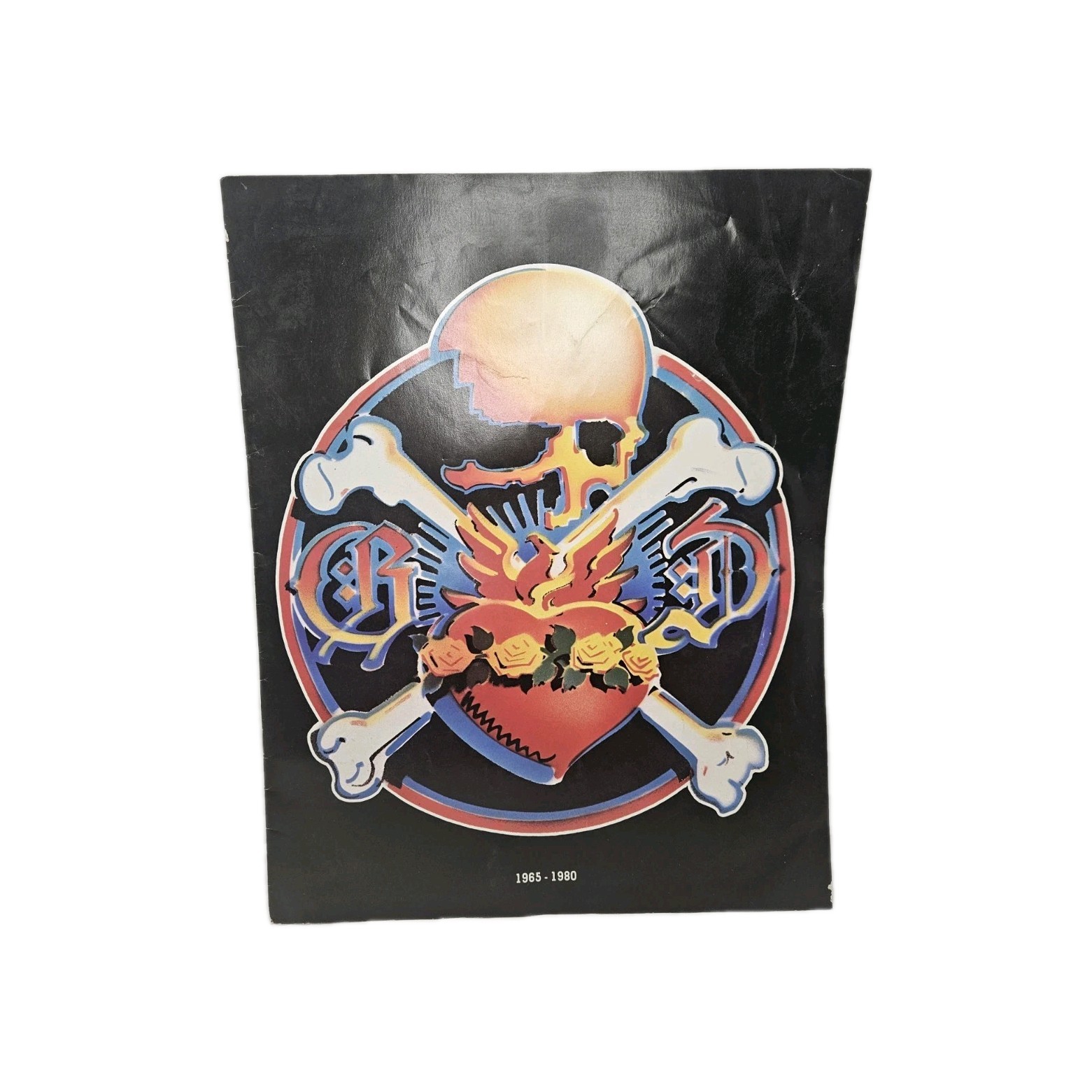 GRATEFUL DEAD 1965 TO 1980 TOUR CONCERT PROGRAM BOOK - RICK GRIFFIN COVER