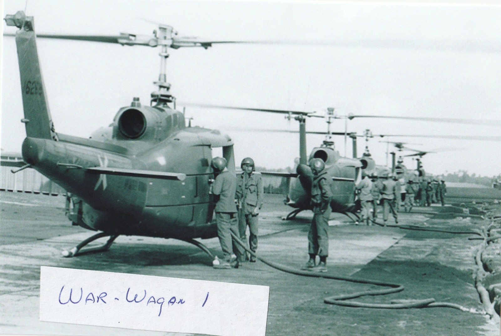 Vietnam  War  Photo --  Soldiers  Fueling Huey Helicopters