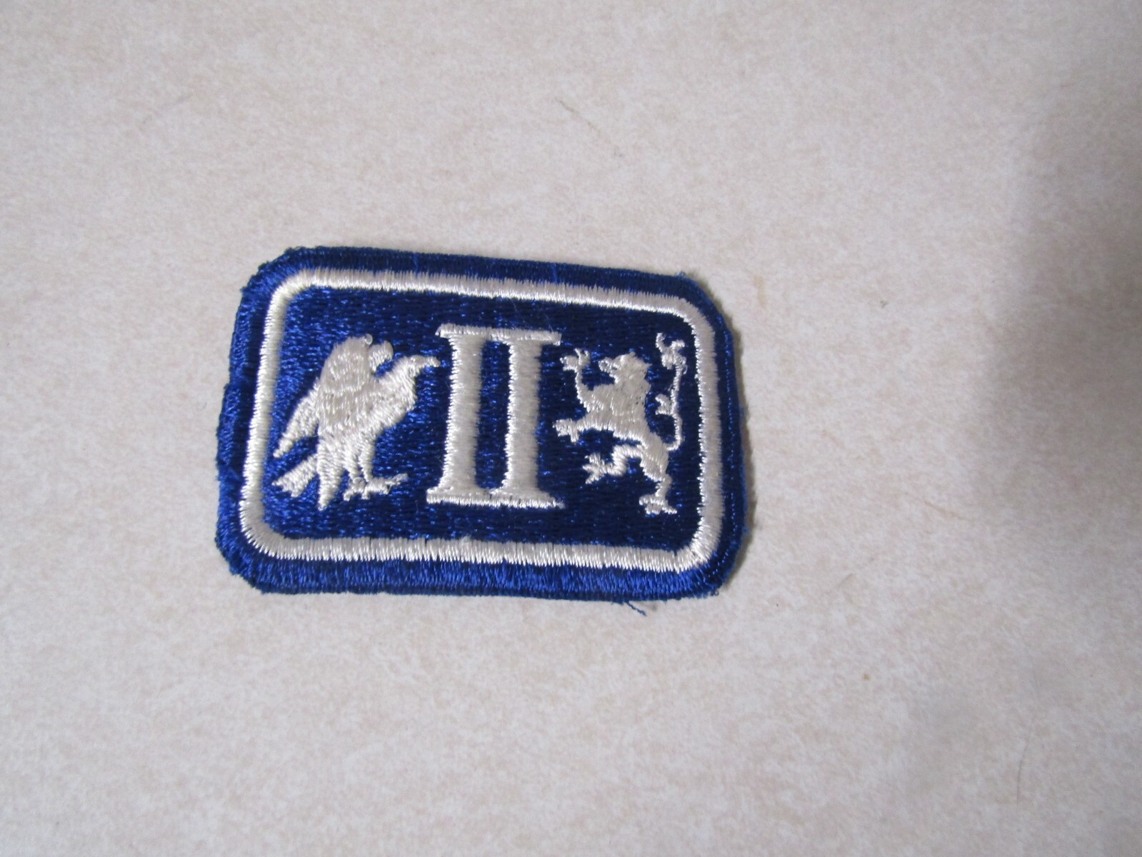 MILITARY PATCH OLD ORIGINAL WW2 ERA US ARMY 2ND CORPS BLUE AND WHITE