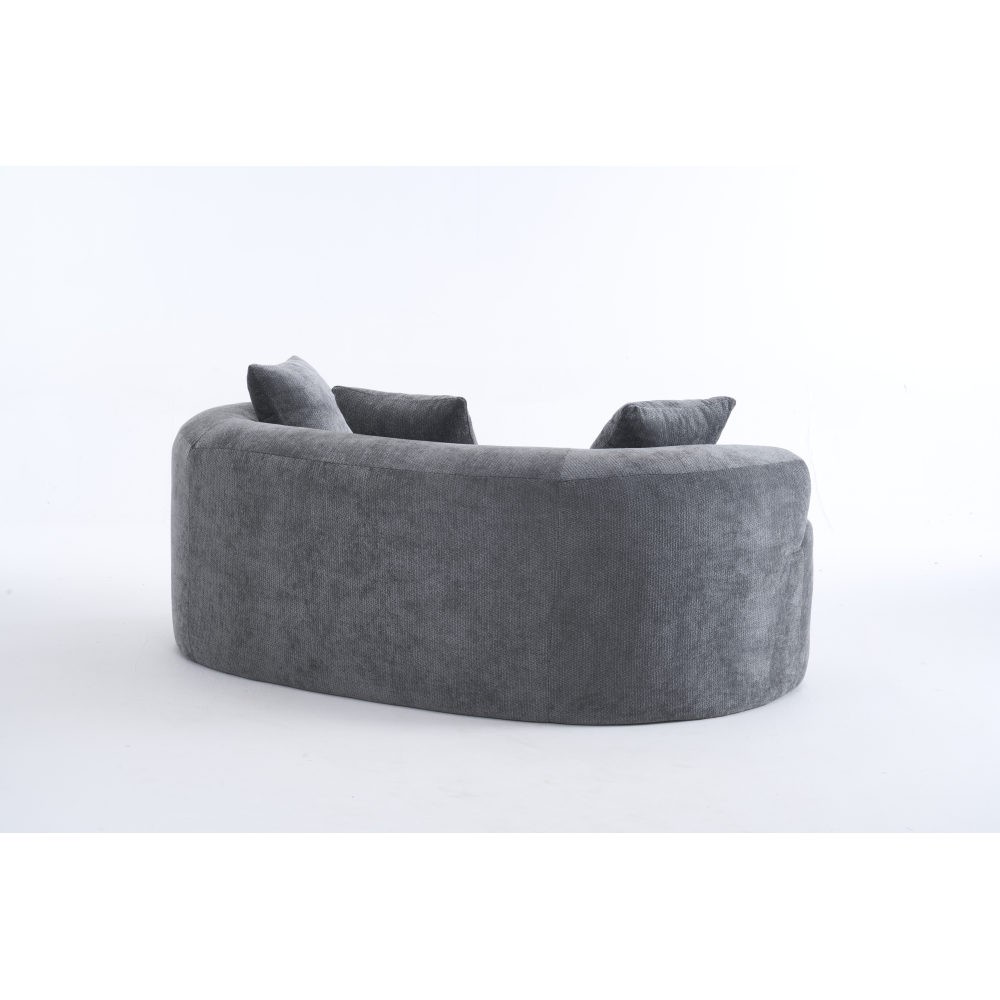 Crescent-shaped sofa, modern low-back design with deep cushions, self-inflating