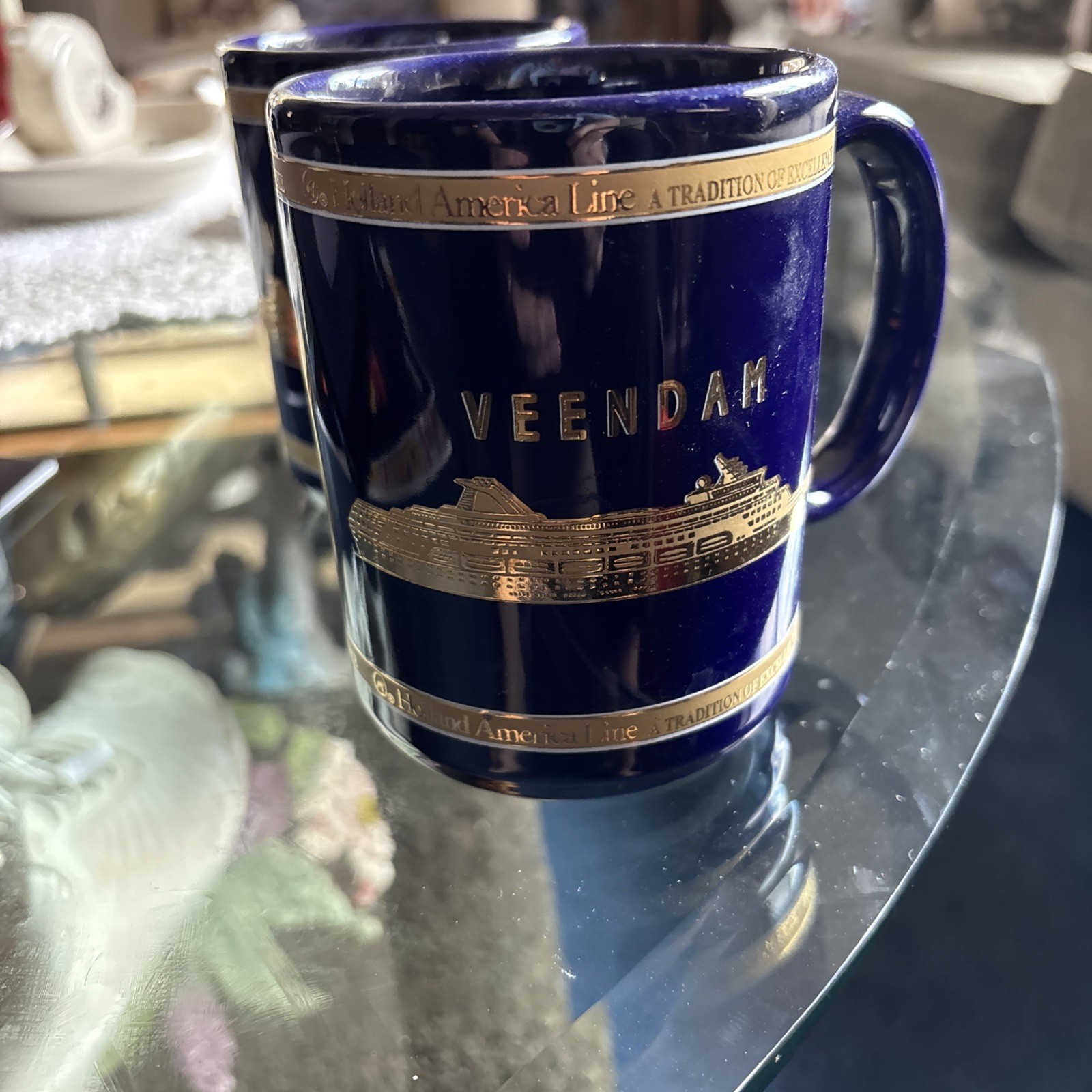 2 holland america veendam 22k gold mugs
